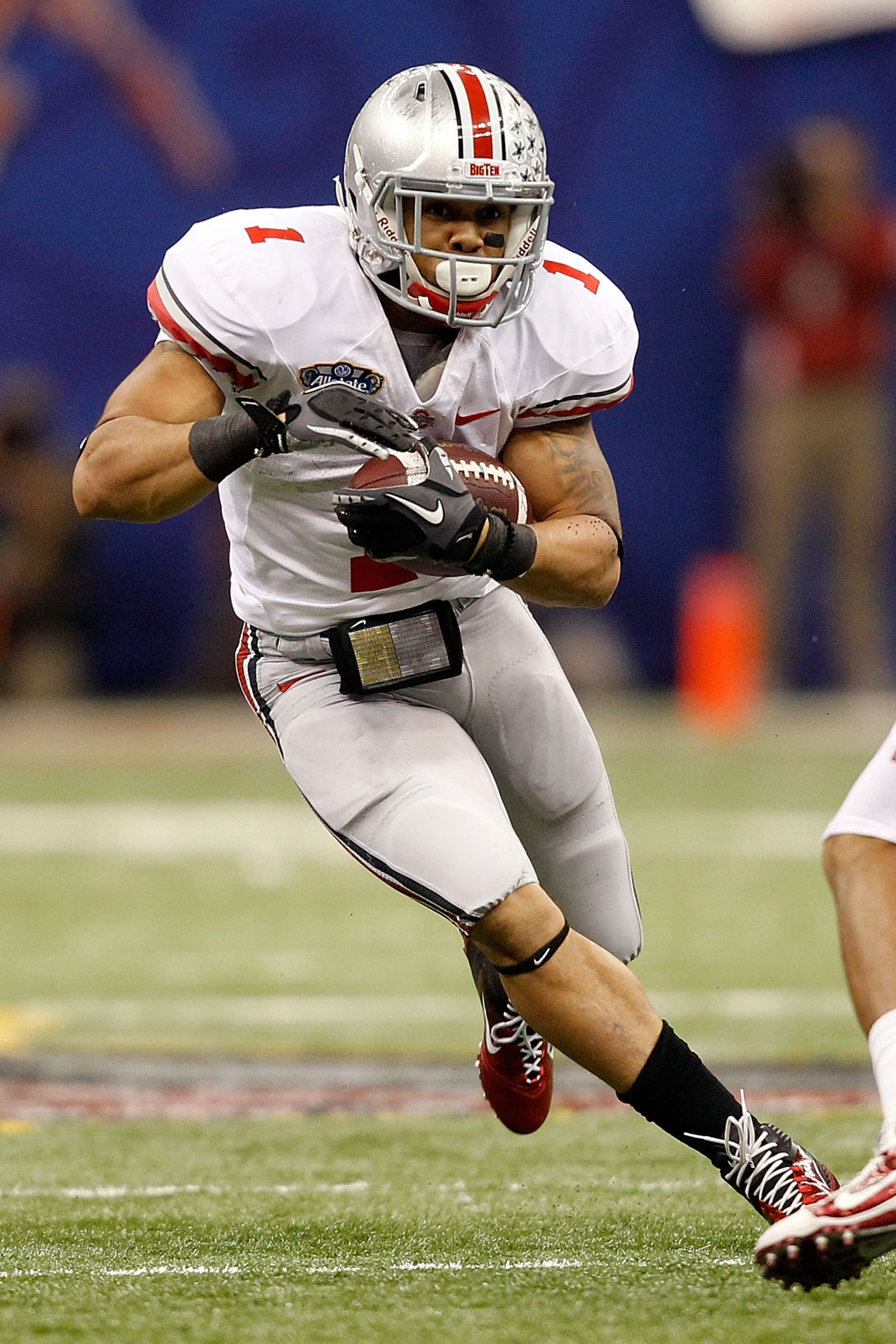 NEW ORLEANS, LA - JANUARY 04: Dan Herron #1 of the Ohio State Buckeyes runs the ball against the Arkansas Razorbacks during the Allstate Sugar Bowl at the Louisiana Superdome on January 4, 2011 in New Orleans, Louisiana. (Photo by Matthew Stockman/Getty NEW ORLEANS, LA - JANUARY 04: Dan Herron #1 of the Ohio State Buckeyes runs the ball against the Arkansas Razorbacks during the Allstate Sugar Bowl at the Louisiana Superdome on January 4, 2011 in New Orleans, Louisiana. (Photo by Matthew Stockman/Getty