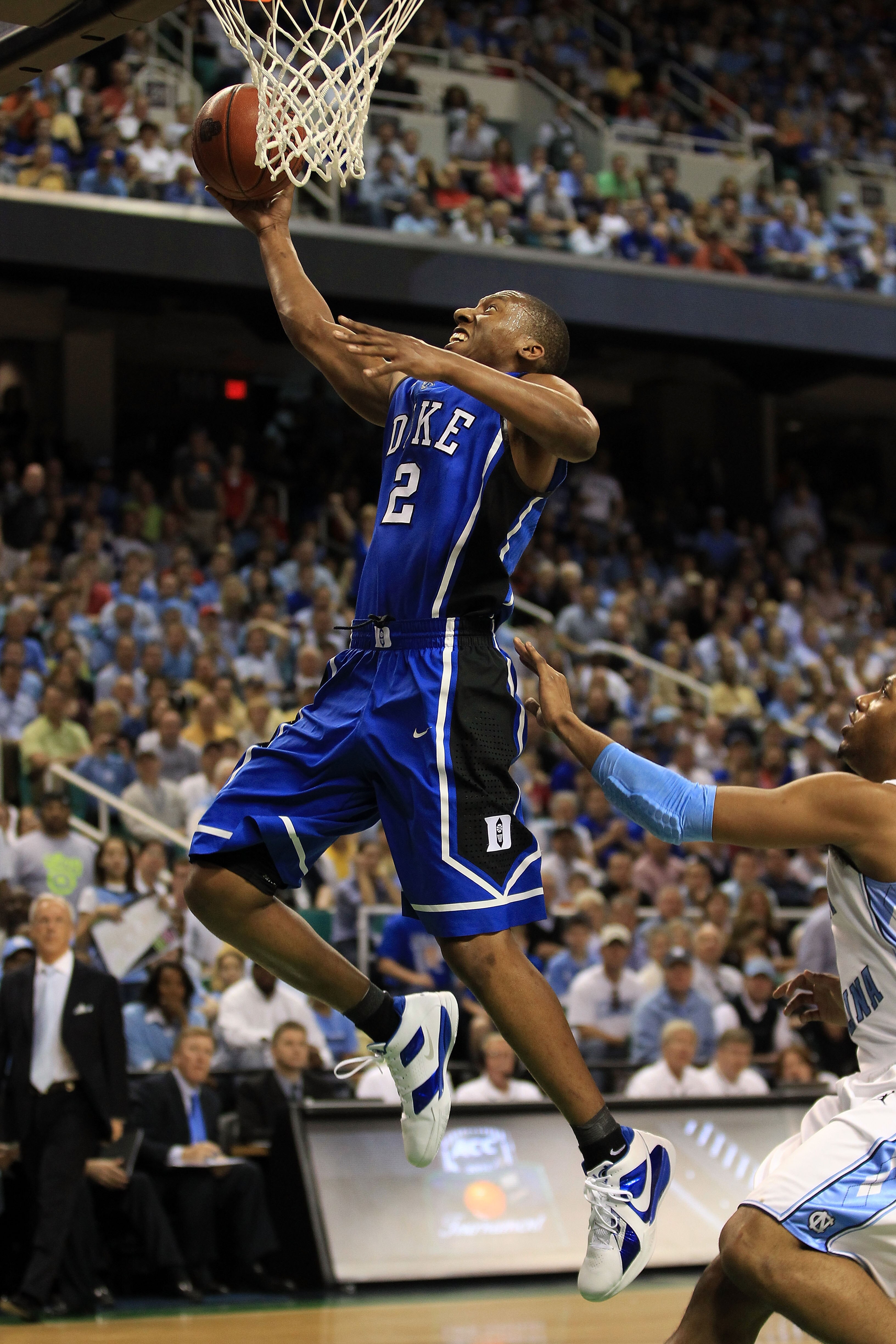 GREENSBORO, NC - MARCH 13:  Nolan Smith #2 of the Duke Blue Devils shoots against the North Carolina Tar Heels during the first half in the championship game of the 2011 ACC men's basketball tournament at the Greensboro Coliseum on March 13, 2011 in Green