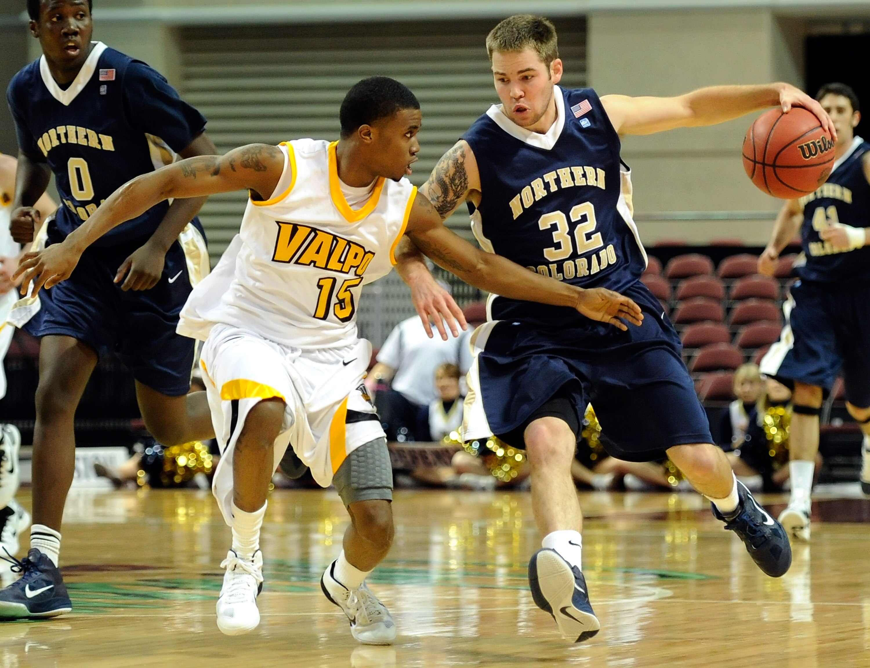 LAS VEGAS - NOVEMBER 26: Devon Beitzel #32 of the Northern Colorado Bears brings the ball up the court against Erik Buggs #15 of the Valparaiso Crusaders during the third round of the Las Vegas Invitational at The Orleans Arena November 26, 2010 in Las V LAS VEGAS - NOVEMBER 26: Devon Beitzel #32 of the Northern Colorado Bears brings the ball up the court against Erik Buggs #15 of the Valparaiso Crusaders during the third round of the Las Vegas Invitational at The Orleans Arena November 26, 2010 in Las V
