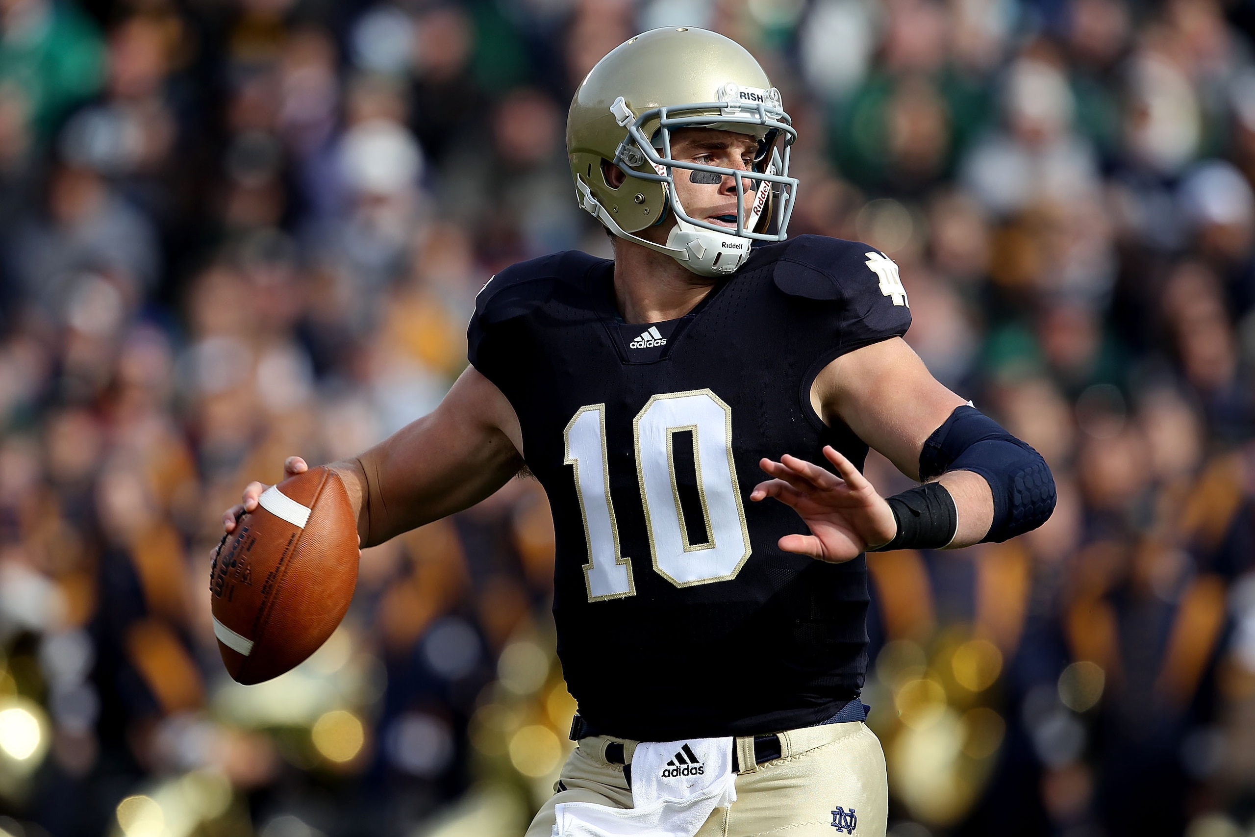 SOUTH BEND, IN - OCTOBER 30: Dayne Crist #10 of the Notre Dame Fighting Irish looks for a receiver against the Tulsa Golden Hurricane at Notre Dame Stadium on October 30, 2010 in South Bend, Indiana. Tulsa defeated Notre Dame 28-27. (Photo by Jonathan Dan SOUTH BEND, IN - OCTOBER 30: Dayne Crist #10 of the Notre Dame Fighting Irish looks for a receiver against the Tulsa Golden Hurricane at Notre Dame Stadium on October 30, 2010 in South Bend, Indiana. Tulsa defeated Notre Dame 28-27. (Photo by Jonathan Dan