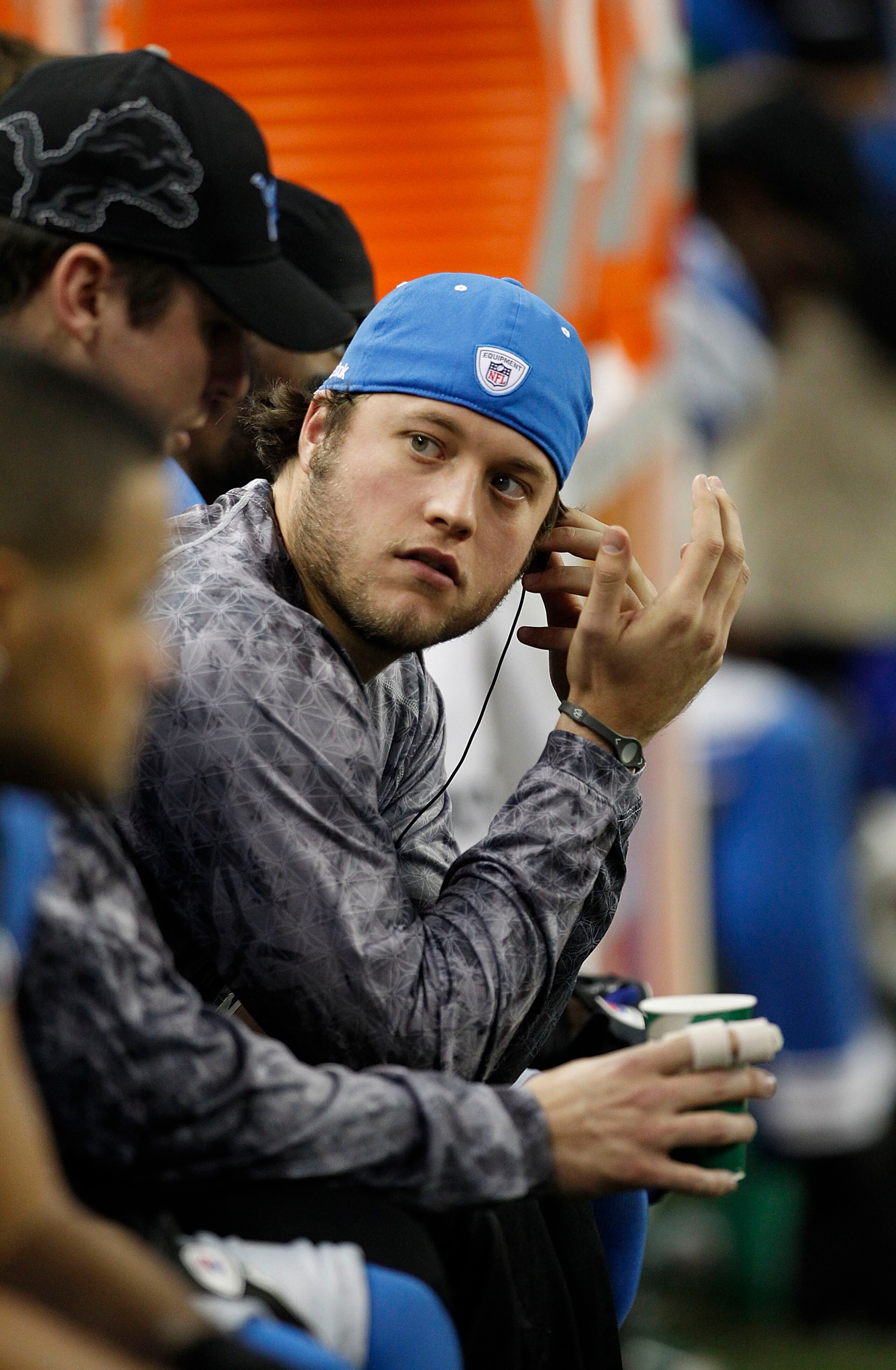 DETROIT - DECEMBER 05: Matthew Stafford #9 of the Detroit Lions sits on the sideline during the game against the Chicago Bears at Ford Field on December 5, 2010 in Detroit, Michigan. The Bears defeated the Lions 24-20.  (Photo by Leon Halip/Getty Images)