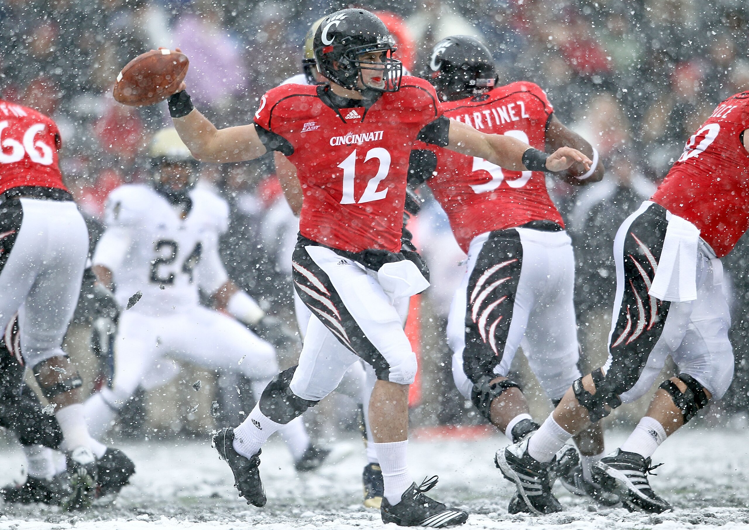 CINCINNATI, OH - DECEMBER 04: Zach Collaros #12 of the Cincinnati Bearcats throws the ball during the Big East Conference game against the Pittsburgh Panthers at Nippert Stadium on December 4, 2010 in Cincinnati, Ohio. Pittsburgh won 28-10. (Photo by A CINCINNATI, OH - DECEMBER 04: Zach Collaros #12 of the Cincinnati Bearcats throws the ball during the Big East Conference game against the Pittsburgh Panthers at Nippert Stadium on December 4, 2010 in Cincinnati, Ohio. Pittsburgh won 28-10. (Photo by A