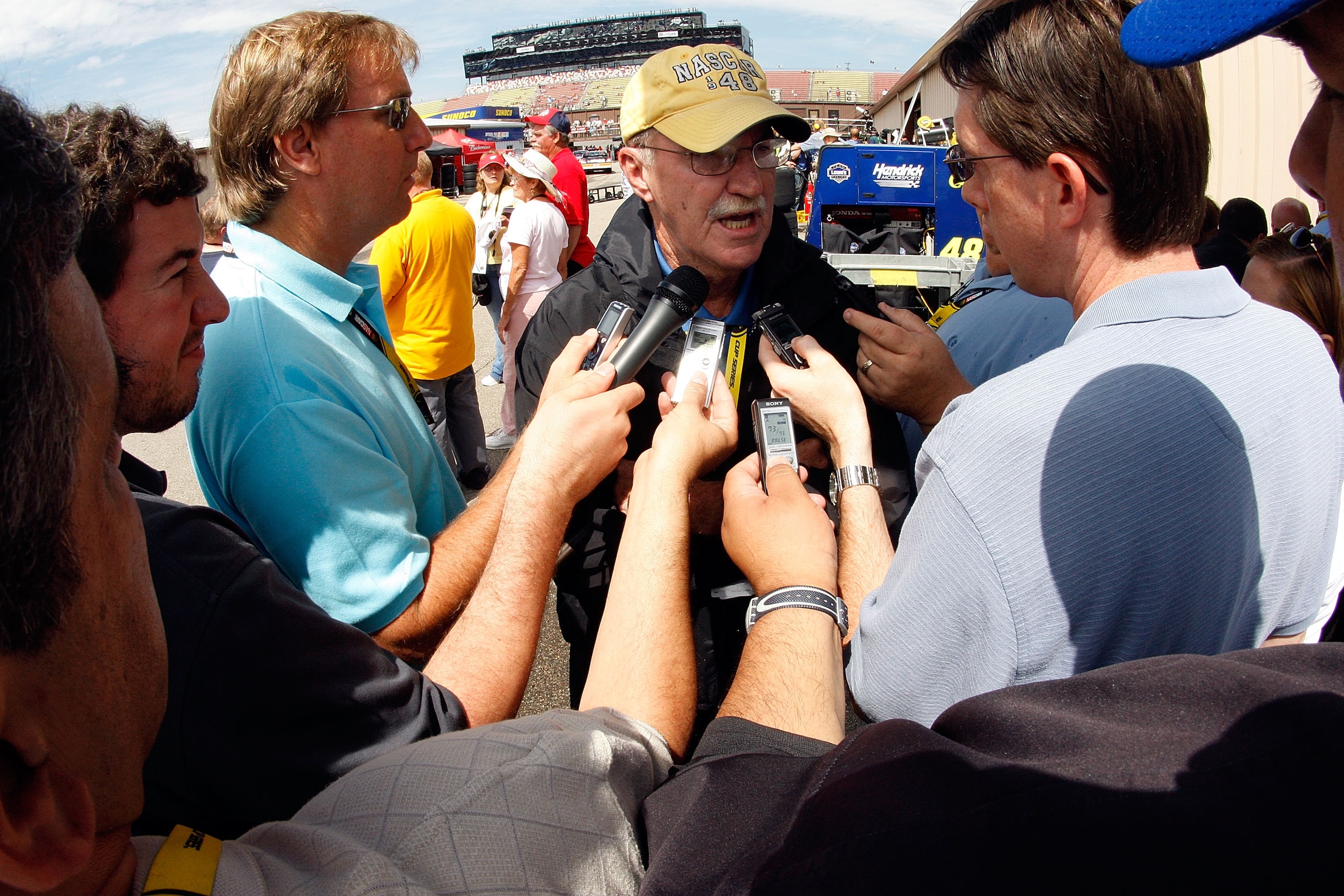 BROOKLYN, MI - JUNE 13:  Jim Hunter, Vice President of Corporate Communications for NASCAR talks with reporters before practice for the NASCAR Sprint Cup Series Lifelock 400 at the Michigan International Speedway on June 13, 2008 in Brooklyn, Michigan.  (