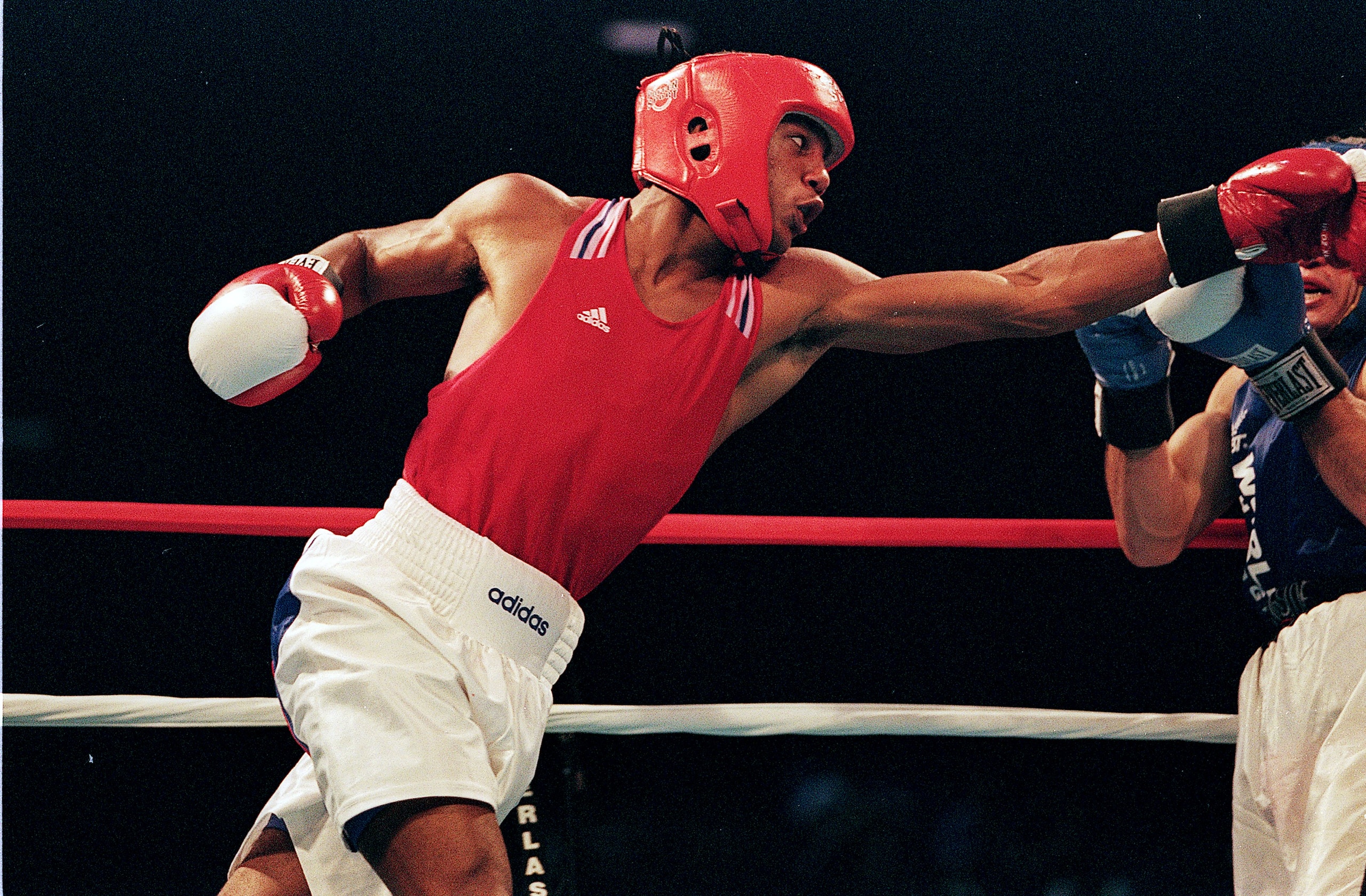27 Aug 1999:  Willy Blain of France throws a left punch at Mahammat Abdullaev of Uzbekistan during the World Boxing Championships at the George Brown Convention Center in Houston,Texas. Mandatory Credit: Al Bello  /Allsport