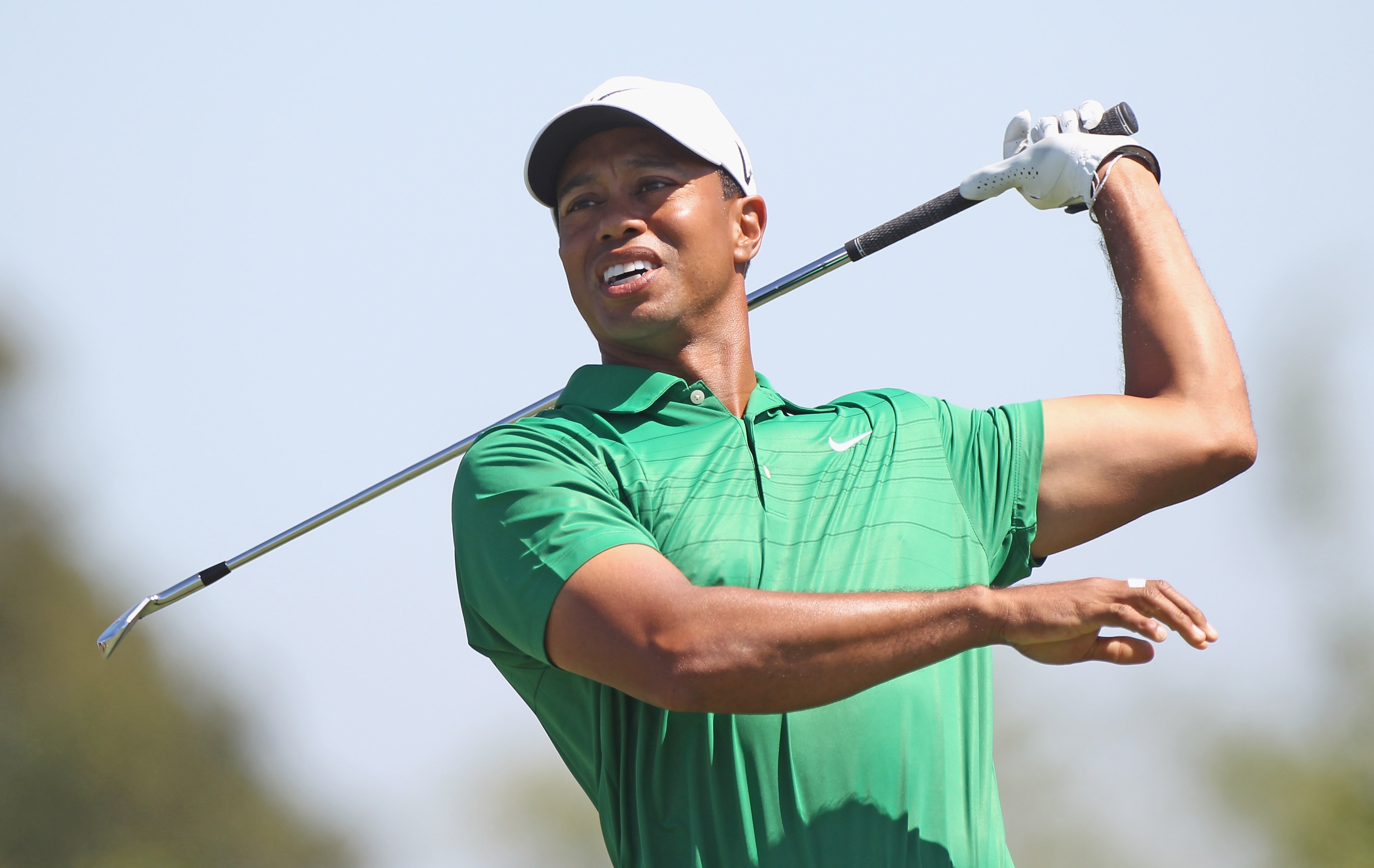 DORAL, FL - MARCH 12:  Tiger Woods reacts to a tee shot on the fourth hole hits his tee shot during the third round of the 2011 WGC- Cadillac Championship at the TPC Blue Monster at the Doral Golf Resort and Spa on March 12, 2011 in Doral, Florida.  (Phot