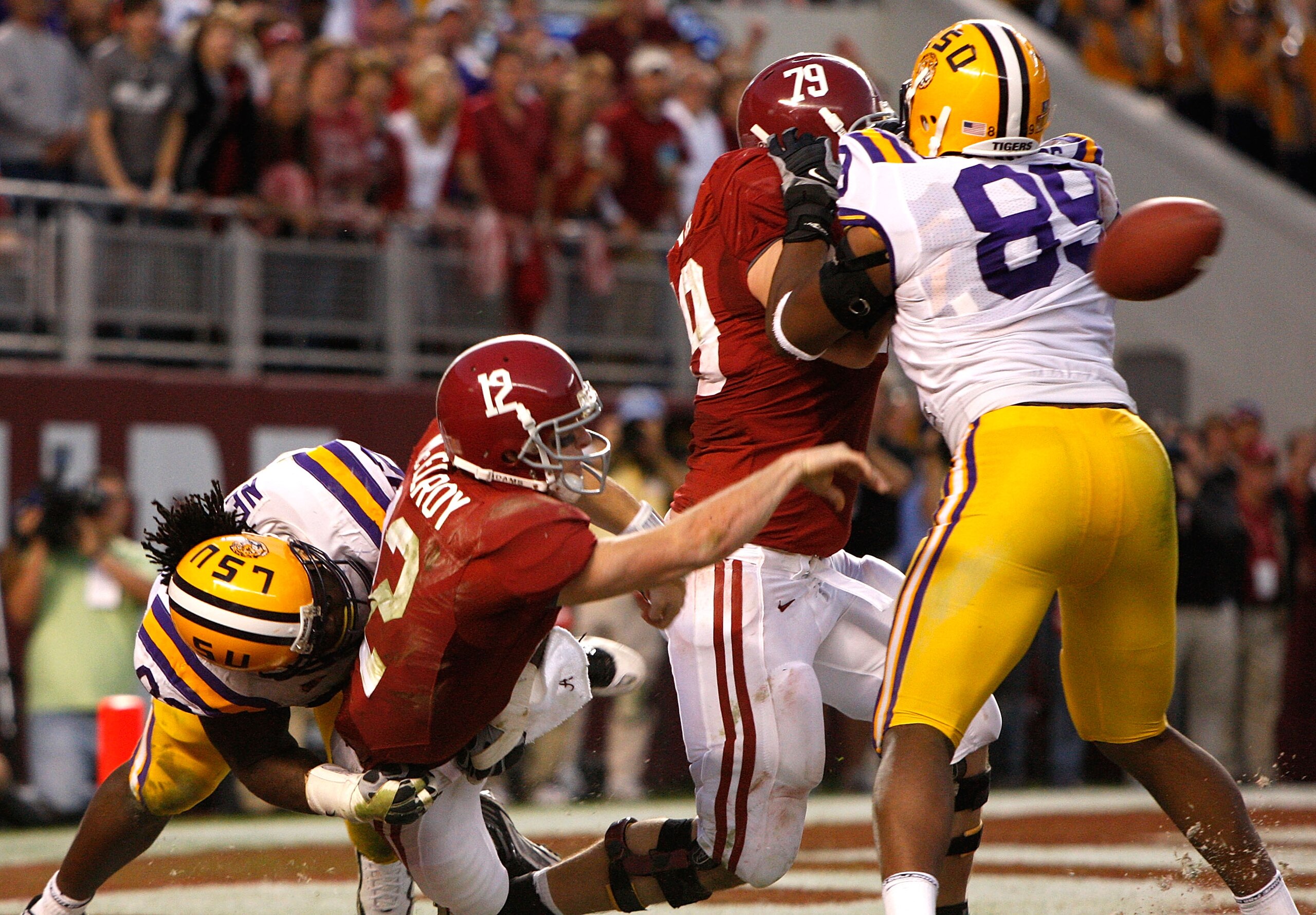 TUSCALOOSA, AL - NOVEMBER 07:  Drake Nevis #92 of the Louisiana State University Tigers sacks quarterback Greg McElroy #12 of the Alabama Crimson Tide at Bryant-Denny Stadium on November 7, 2009 in Tuscaloosa, Alabama.  McElroy was called for intentional