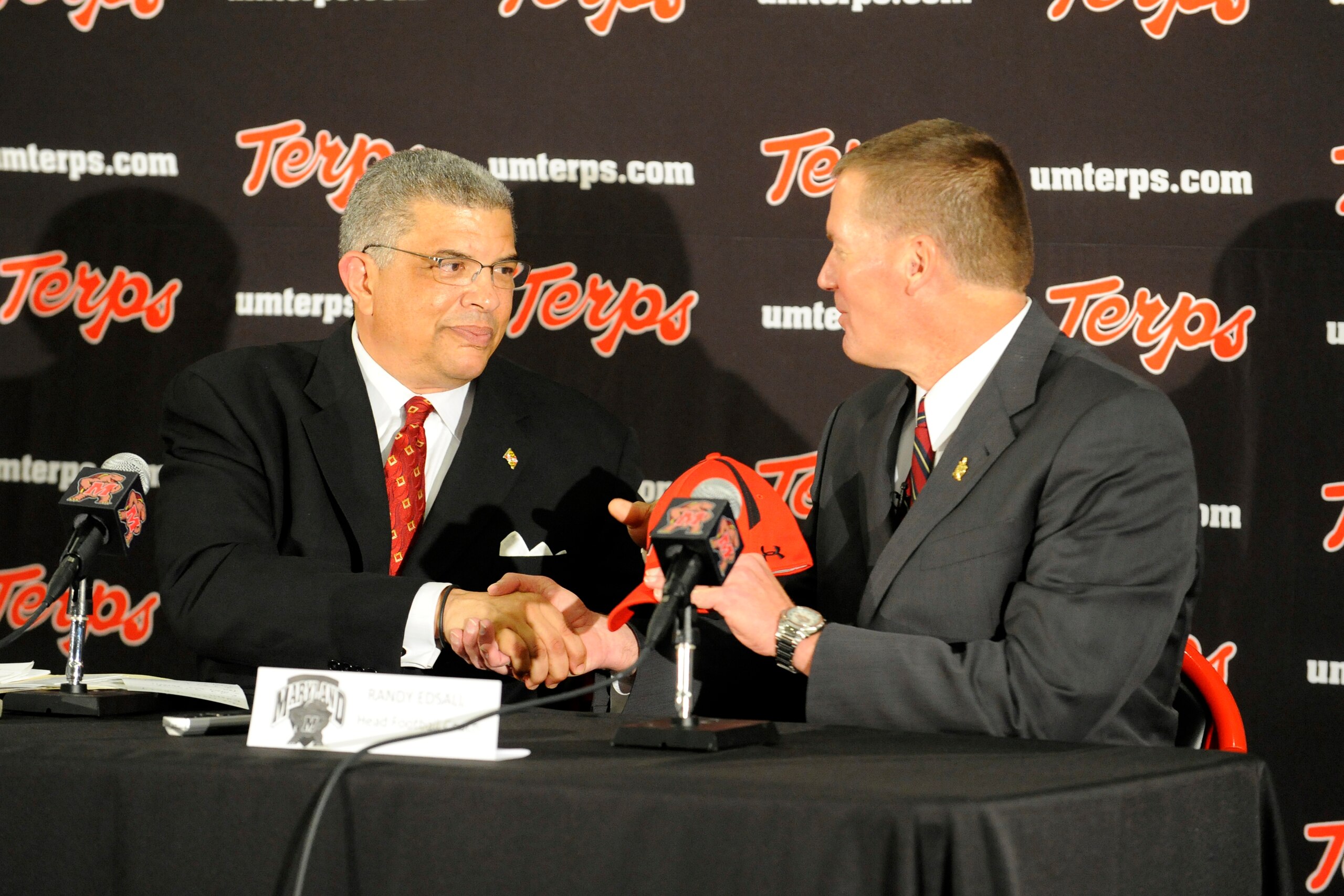 COLLEGE PARK, MD - JANUARY 3:  Athletic Director Kevin Anderson (L) of the University of Maryland introduces Randy Edsall as its new head football coach on January 3, 2011 at the Byrd Stadium in College Park, Maryland.  (Photo by Mitchell Layton/Getty Ima