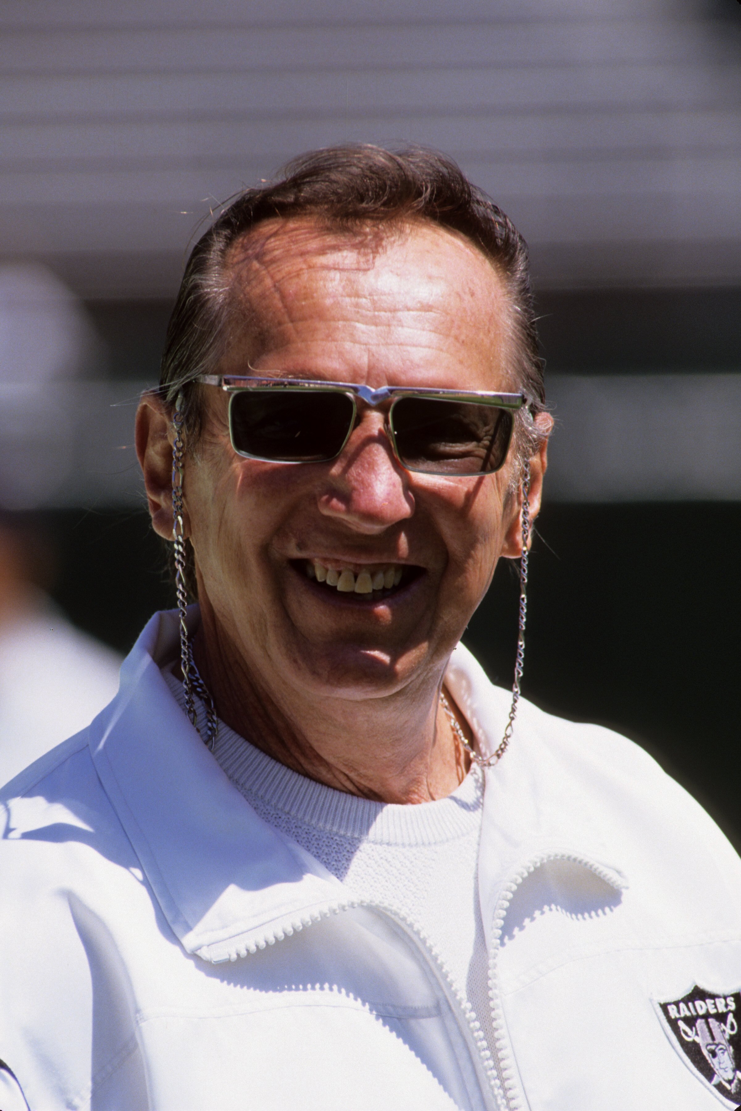 OAKLAND, CA - AUGUST 12:  Oakland Raiders owner Al Davis cracks a smile before the game against the St. Louis Rams at Oakland-Alameda County Coliseum on August 12, 1995 in Oakland, California.  The Raiders won 27-22. (Photo by George Rose/Getty Images)