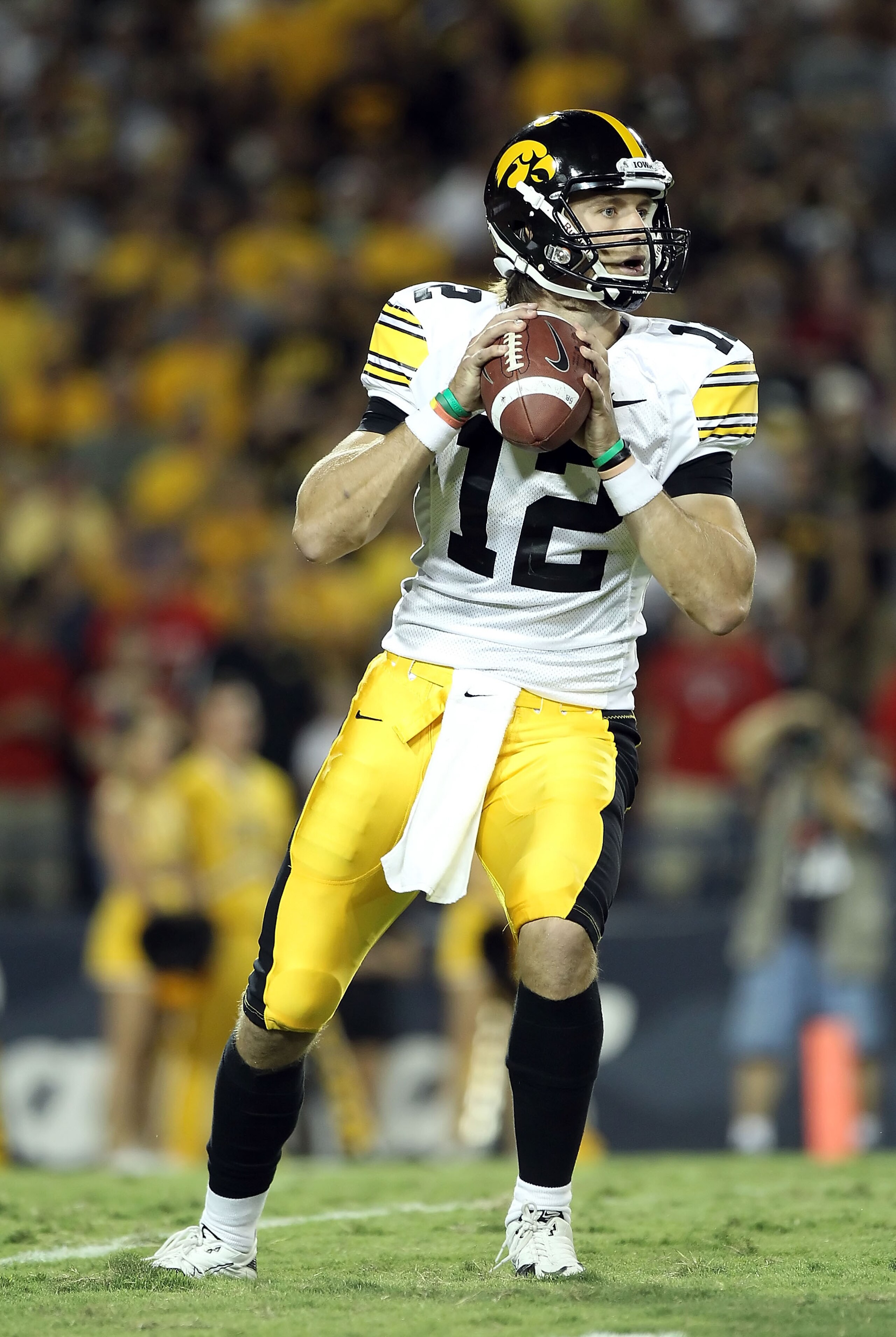 TUCSON, AZ - SEPTEMBER 18:  Quarterback Ricky Stanzi #12 of the Iowa Hawkeyes in action during the college football game against the Arizona Wildcats at Arizona Stadium on September 18, 2010 in Tucson, Arizona.  The Wildcats defeated the Hawkeyes 34-27.  