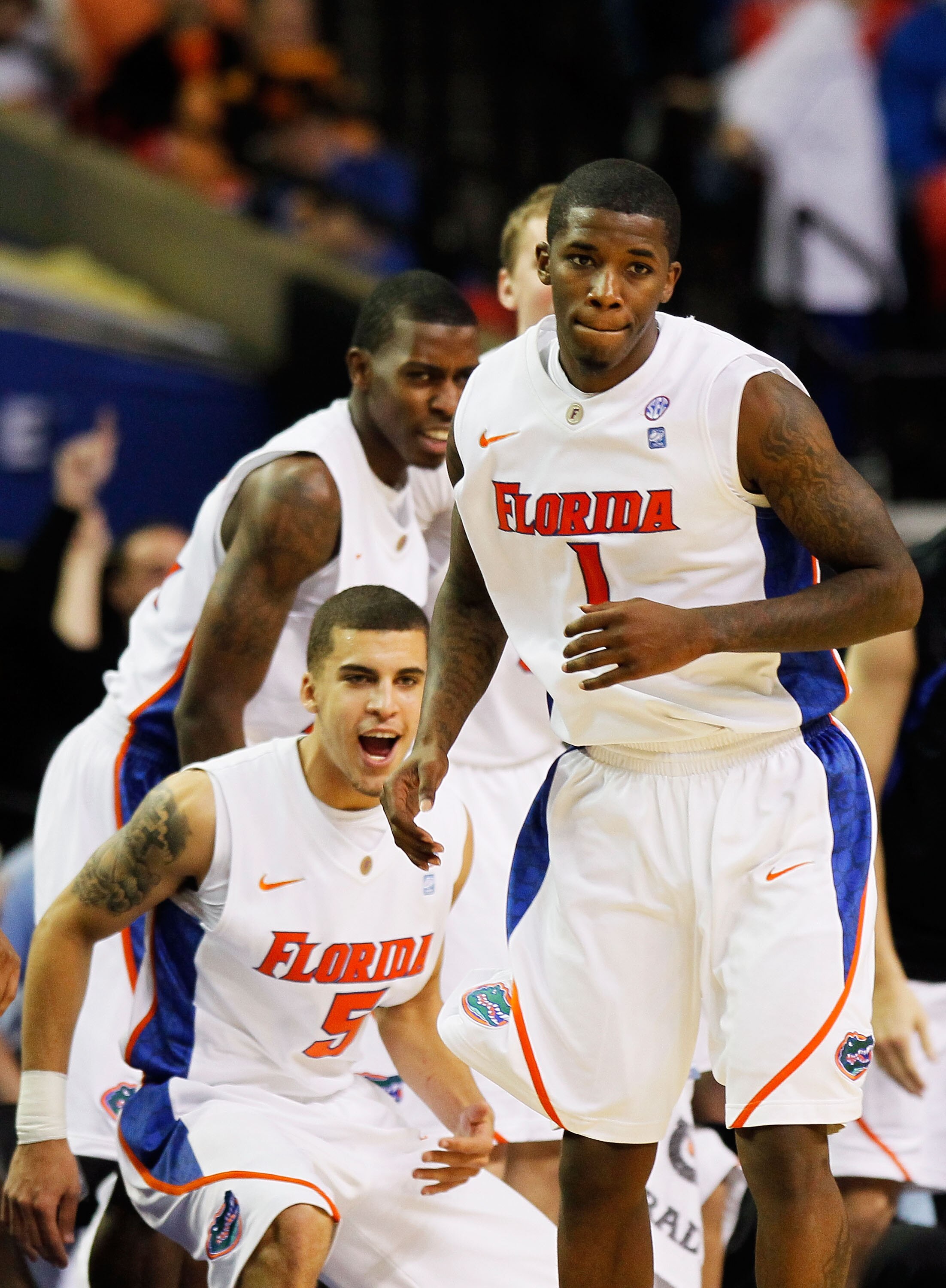 ATLANTA, GA - MARCH 11:  Kenny Boynton #1 of the Florida Gators reacts after scoring a three pointer against the Tennessee Volunteers as teammmate Scottie Wilbekin #5 looks on during the quarterfinals of the SEC Men's Basketball Tournament at Georgia Dome