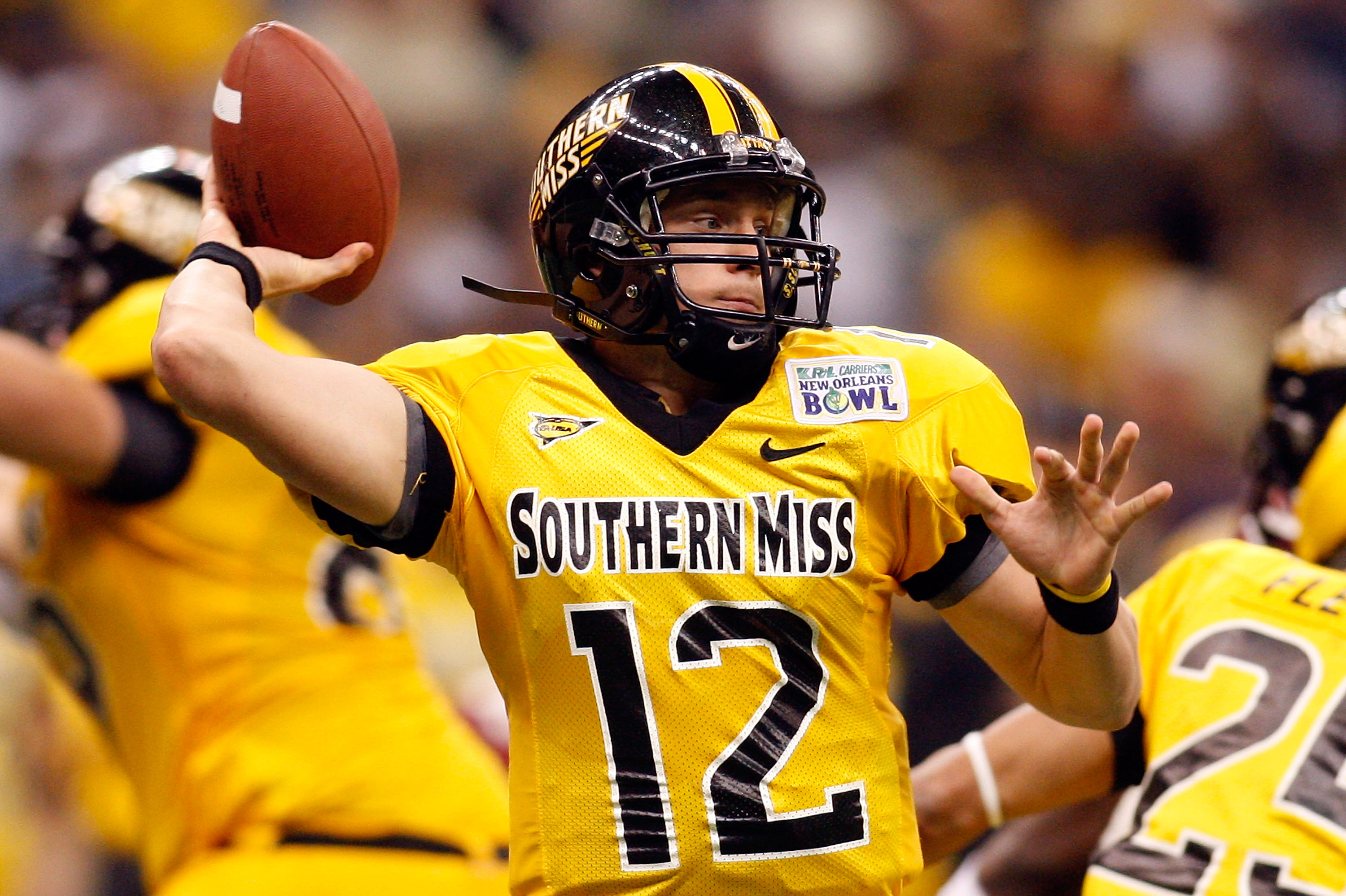 NEW ORLEANS - DECEMBER 21: Quarterback Austin Davis #12 of the Southern Mississippi Golden Eagles looks to throw a pass against the Troy Trojans during the R+L Carriers New Orleans Bowl on December 21, 2008 at the Superdome in New Orleans, Louisiana. Davi