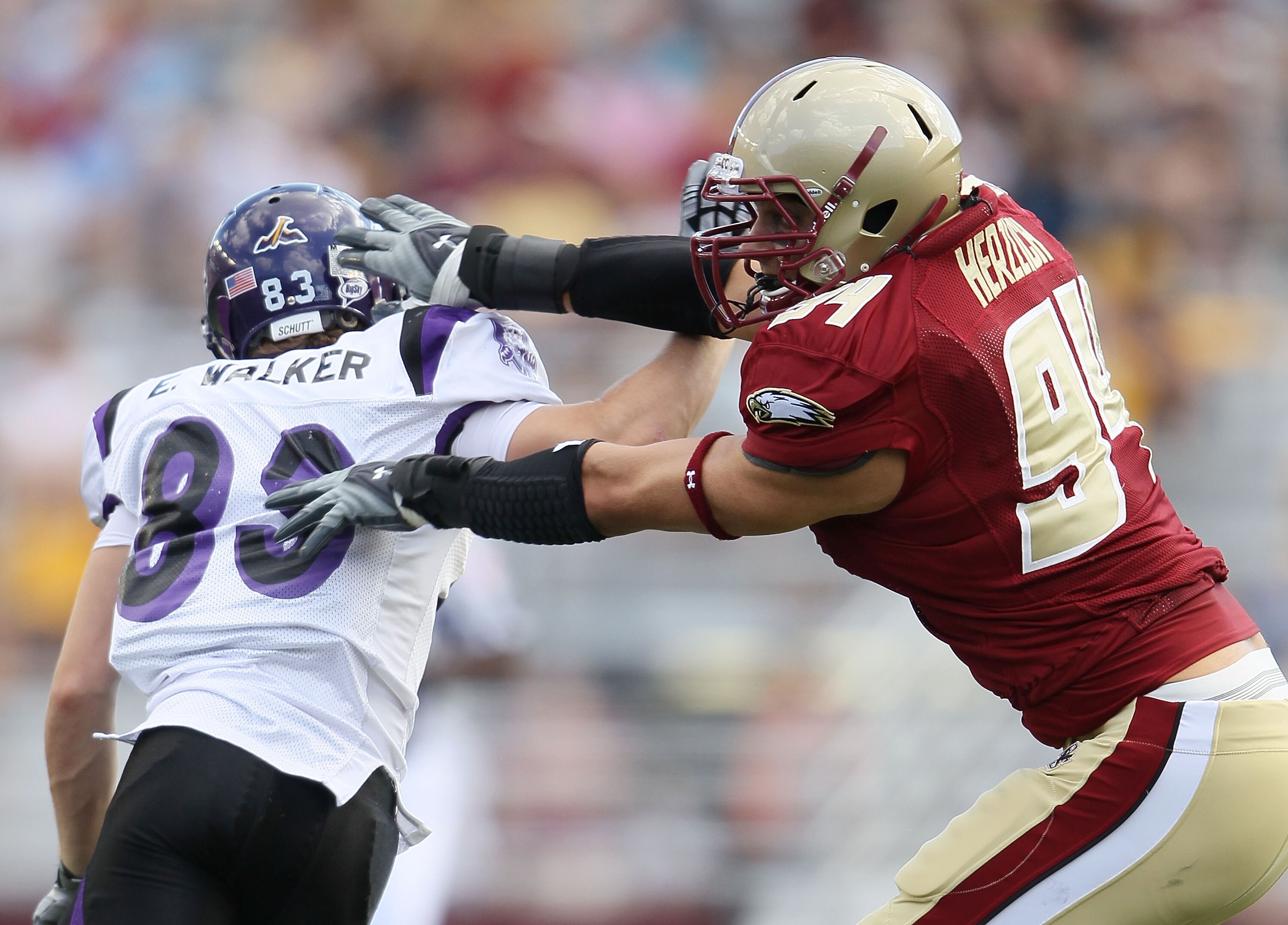 CHESTNUT HILL, MA - SEPTEMBER 04:  Mark Herzlich #94 of the Boston College Eagles blocks Erik Walker #83 of the Weber State Wildcats on September 4, 2010 at Alumni Stadium in Chestnut Hill, Massachusetts. Boston College defeated Weber State 38-20.  (Photo
