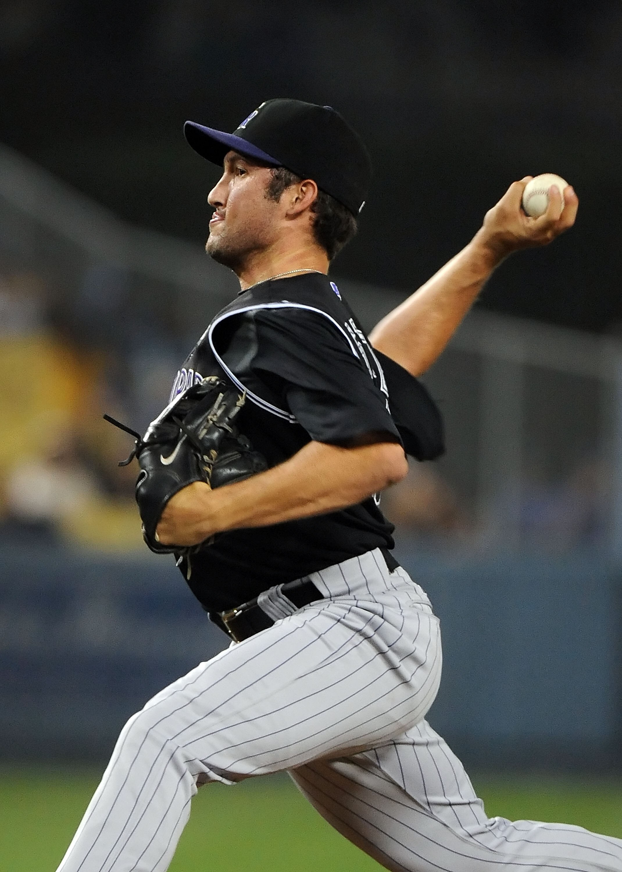 LOS ANGELES, CA - SEPTEMBER 17:  Huston Street #16 of the Colorado Rockies pitches against the Los Angeles Dodgers at Dodger Stadium on September 17, 2010 in Los Angeles, California.  (Photo by Lisa Blumenfeld/Getty Images)
