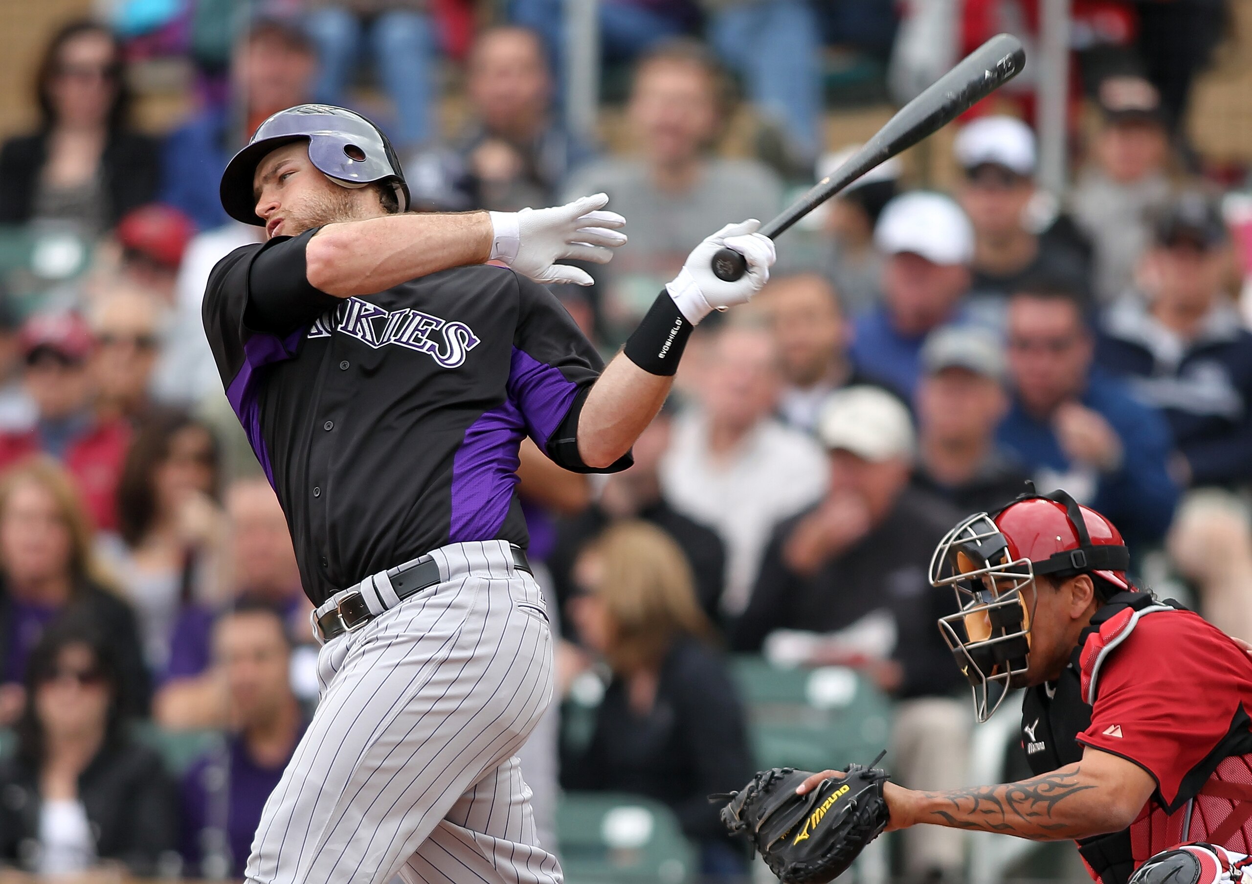 SCOTTSDALE, AZ - FEBRUARY 26: Chris Iannetta #20 of the Colorado Rockies swings against the game against the Arizona Diamondbacks at Salt River Fields on February 26, 2011in Scottsdale, Arizona.. (Photo by Jonathan Ferrey/Getty Images) SCOTTSDALE, AZ - FEBRUARY 26: Chris Iannetta #20 of the Colorado Rockies swings against the game against the Arizona Diamondbacks at Salt River Fields on February 26, 2011in Scottsdale, Arizona.. (Photo by Jonathan Ferrey/Getty Images)