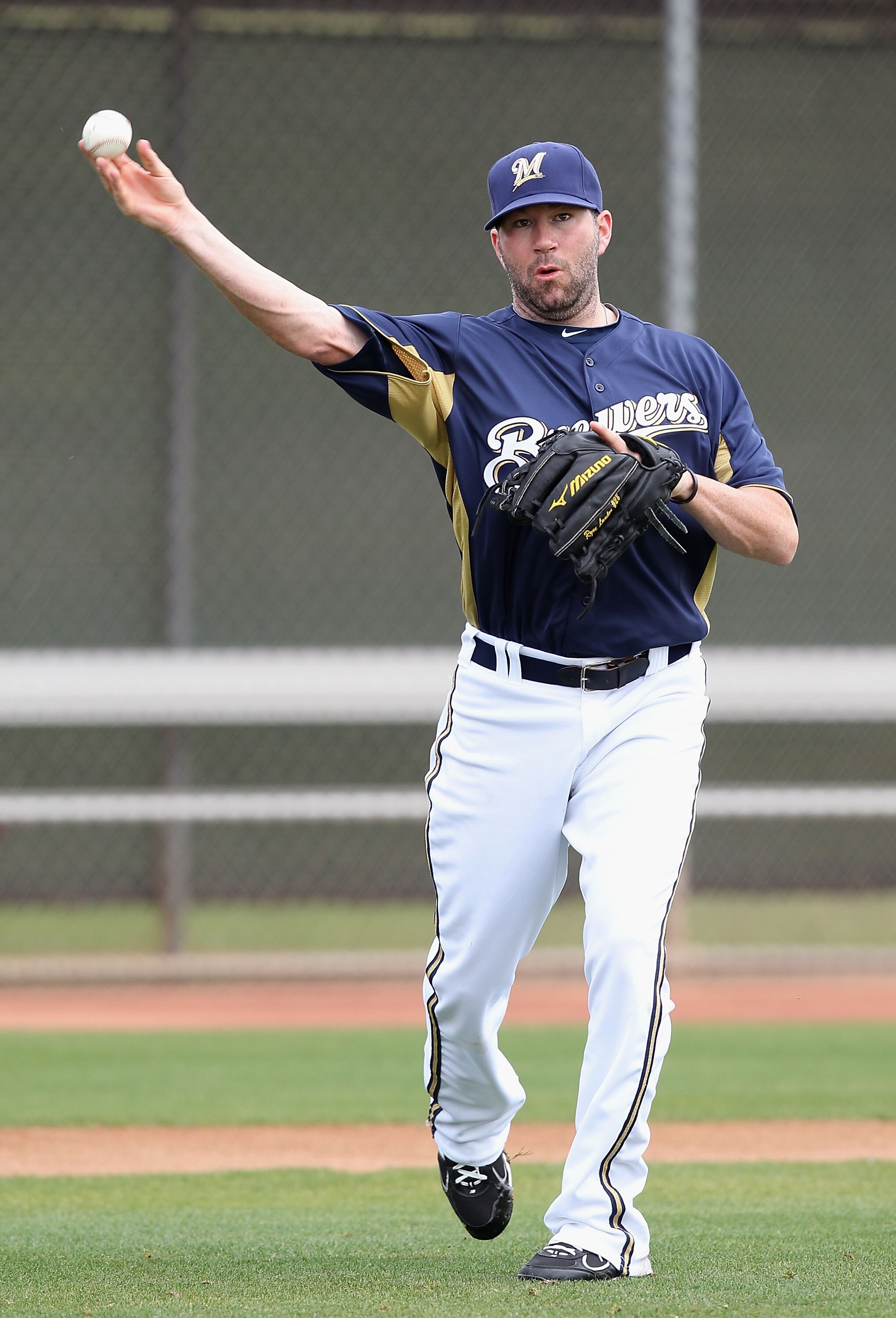PHOENIX, AZ - FEBRUARY 18:  Pitcher Shaun Marcum #18 of the Milwaukee Brewers participates in fielding drills during a MLB spring training practice at Maryvale Baseball Park on February 18, 2011 in Phoenix, Arizona.  (Photo by Christian Petersen/Getty Ima