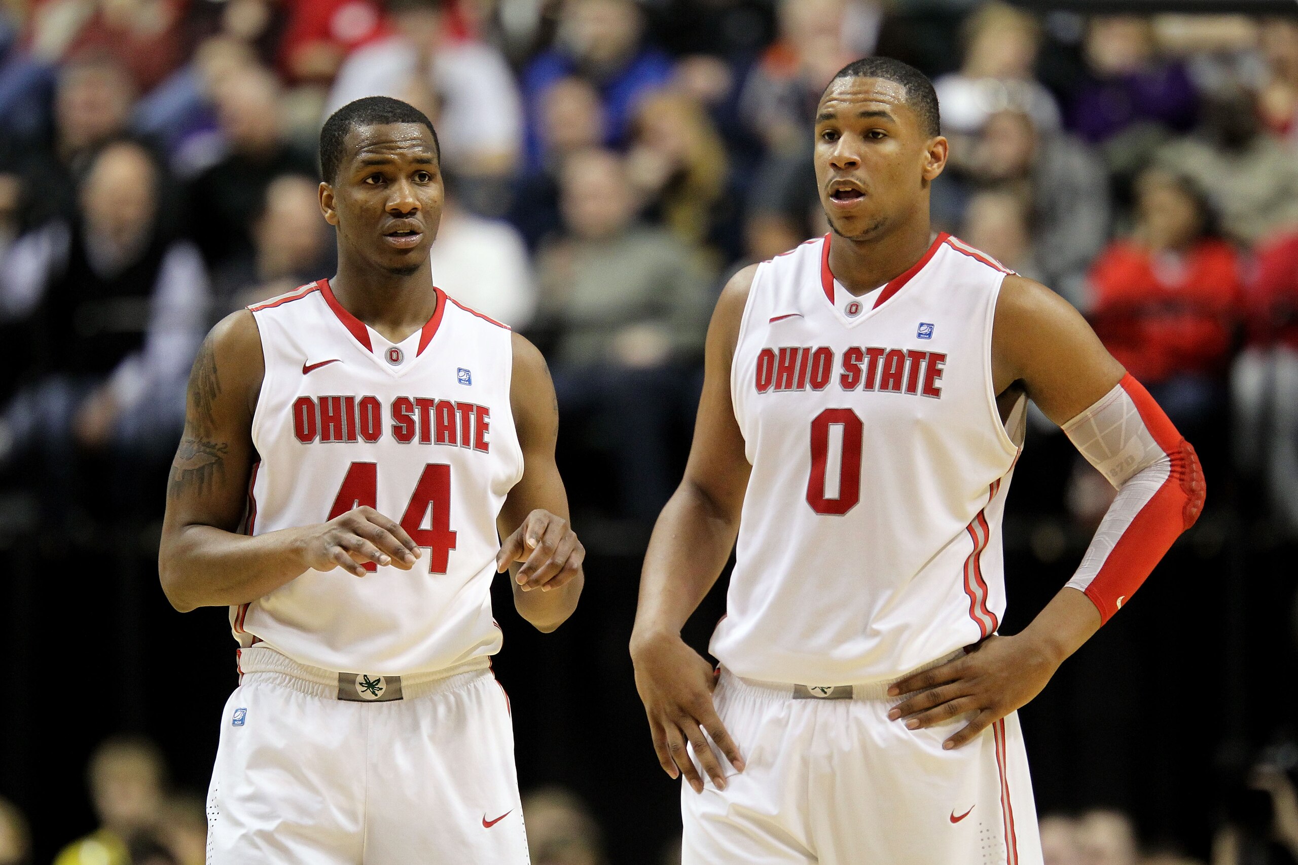 INDIANAPOLIS, IN - MARCH 12: William Buford #44 and Jared Sullinger #0 of the Ohio State Buckeyes look on against the Michigan Wolverines during the semifinals of the 2011 Big Ten Men's Basketball Tournament at Conseco Fieldhouse on March 12, 2011 in Ind INDIANAPOLIS, IN - MARCH 12: William Buford #44 and Jared Sullinger #0 of the Ohio State Buckeyes look on against the Michigan Wolverines during the semifinals of the 2011 Big Ten Men's Basketball Tournament at Conseco Fieldhouse on March 12, 2011 in Ind