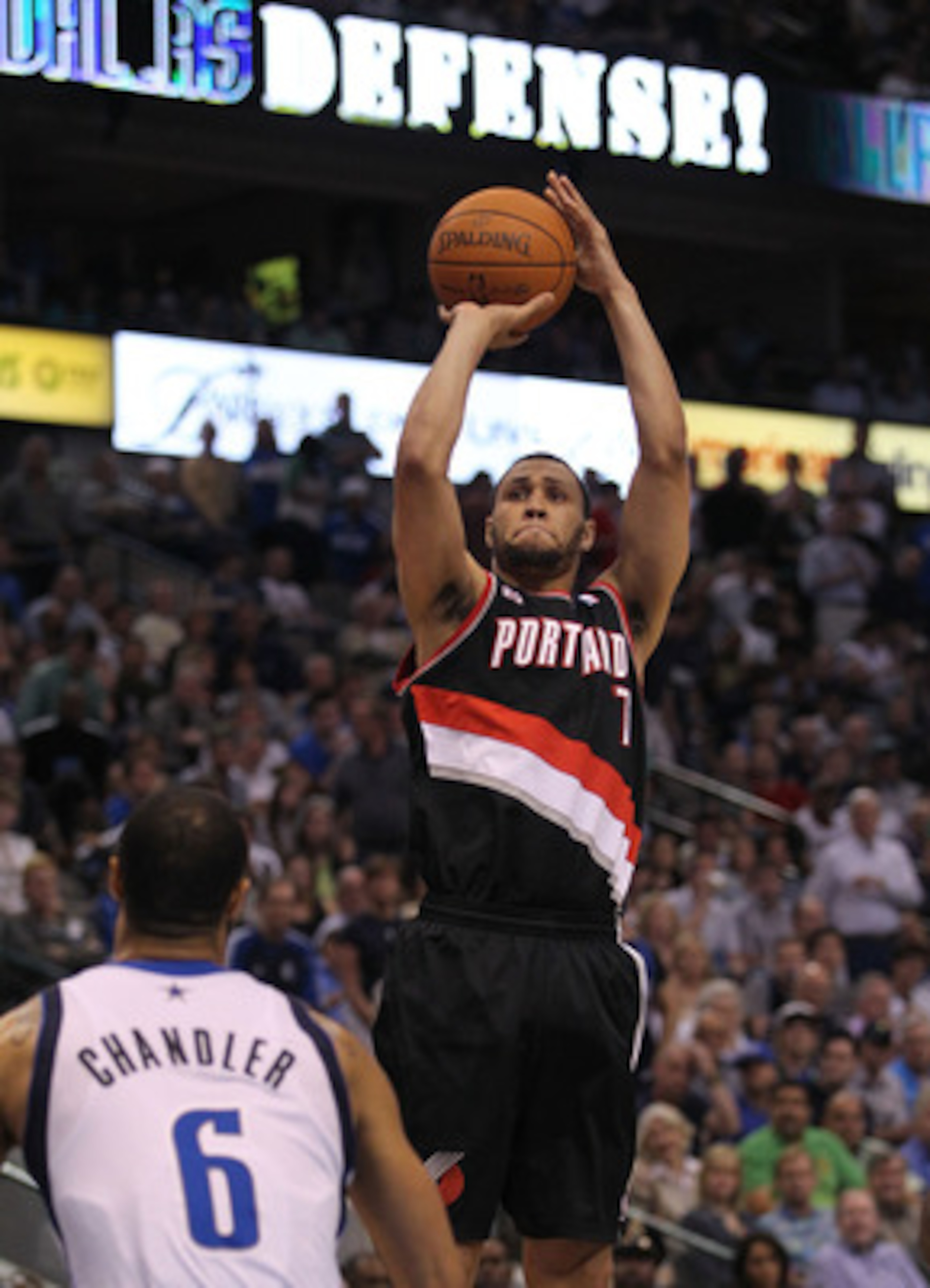 DALLAS, TX - APRIL 25:  Guard Brandon Roy #7 of the Portland Trail Blazers takes a shot against Tyson Chandler #6 of the Dallas Mavericks in Game Five of the Western Conference Quarterfinals during the 2011 NBA Playoffs on April 25, 2011 at American Airli