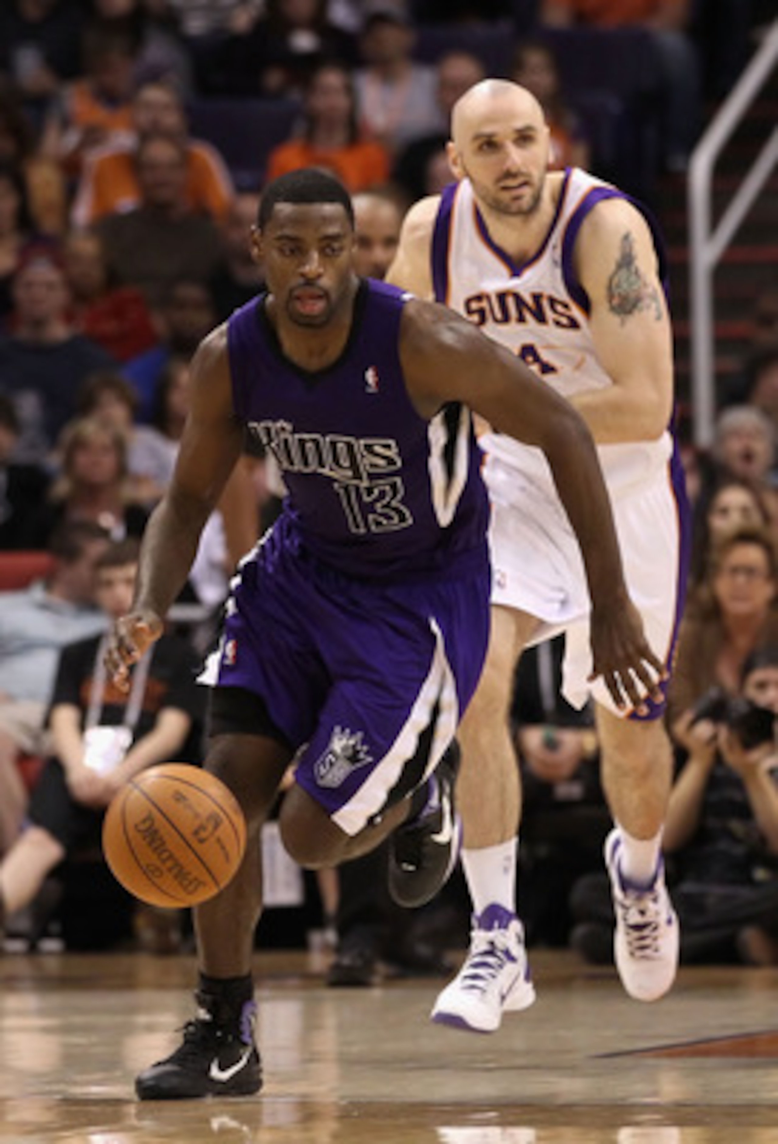 PHOENIX, AZ - FEBRUARY 13:  Tyreke Evans #13 of the Sacramento Kings handles the ball during the NBA game against the Phoenix Suns at US Airways Center on February 13, 2011 in Phoenix, Arizona.  NOTE TO USER: User expressly acknowledges and agrees that, b