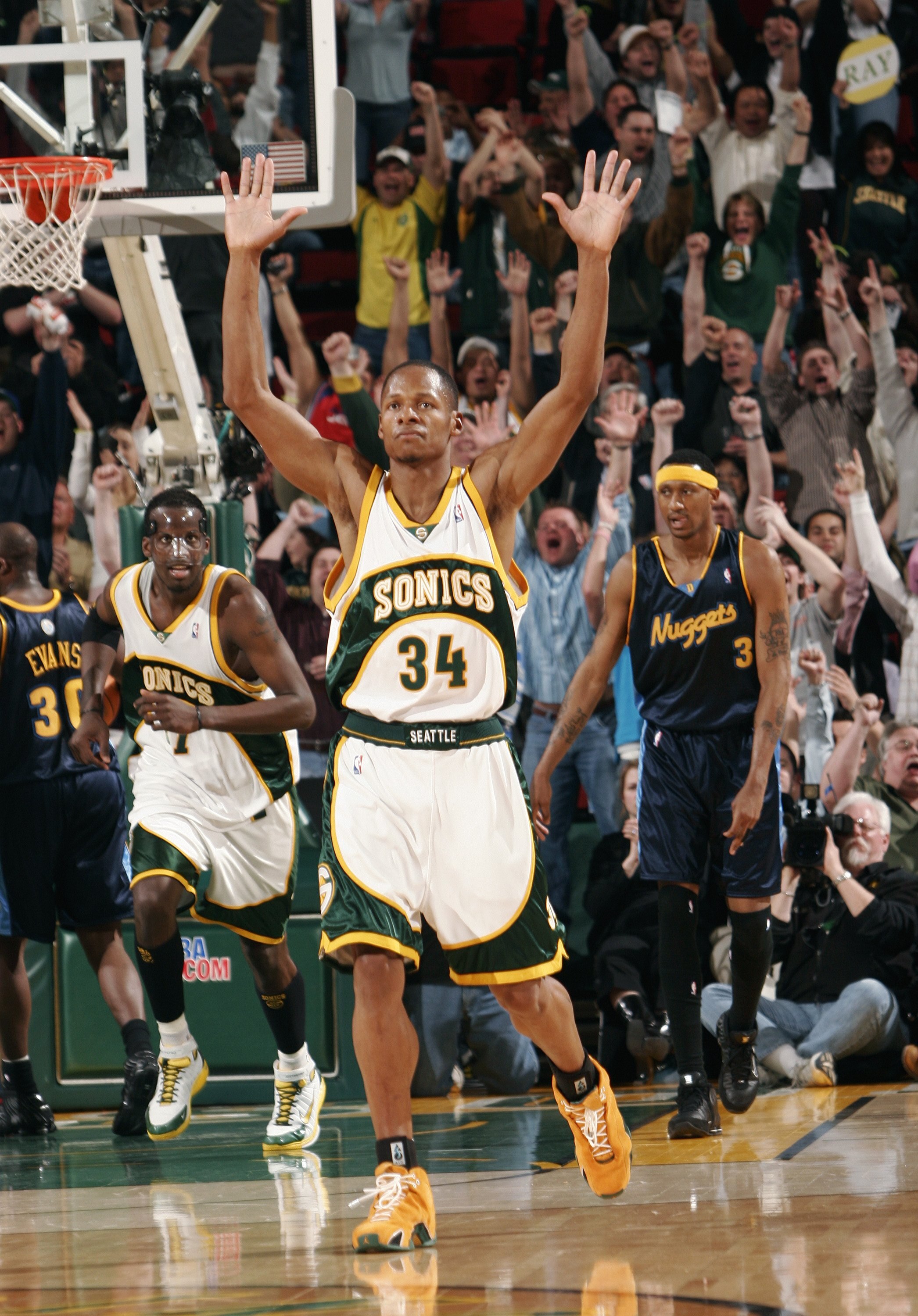 SEATTLE - APRIL 19:  Ray Allen #34 of the Seattle SuperSonics reacts after hitting his sixth three-point shot of the game against the Denver Nuggets, breaking the NBA record for most three-pointers by a player in a season (267), on April 19, 2006 at Key A