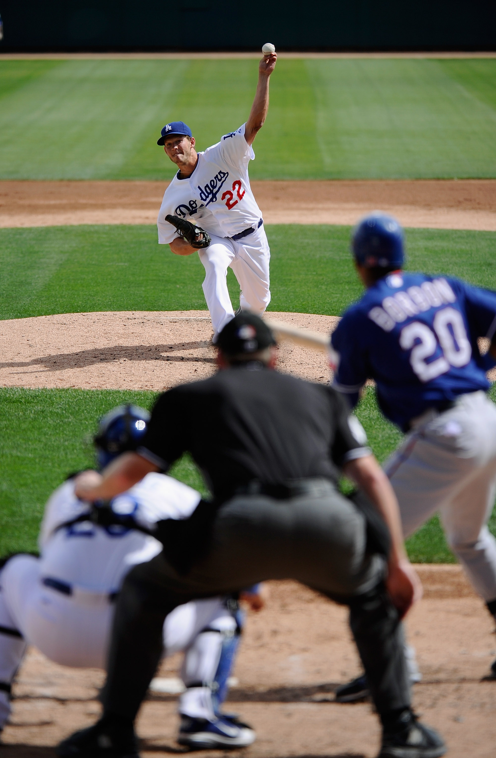 GLENDALE, AZ - MARCH 15: Pitcher Clayton Kershaw #22 of the Los Angeles Dodgers throws a pitch against Texas Rangers during the spring training baseball game at Camelback Ranch on March 15, 2011 in Glendale, Arizona. (Photo by Kevork Djansezian/Getty Im GLENDALE, AZ - MARCH 15: Pitcher Clayton Kershaw #22 of the Los Angeles Dodgers throws a pitch against Texas Rangers during the spring training baseball game at Camelback Ranch on March 15, 2011 in Glendale, Arizona. (Photo by Kevork Djansezian/Getty Im