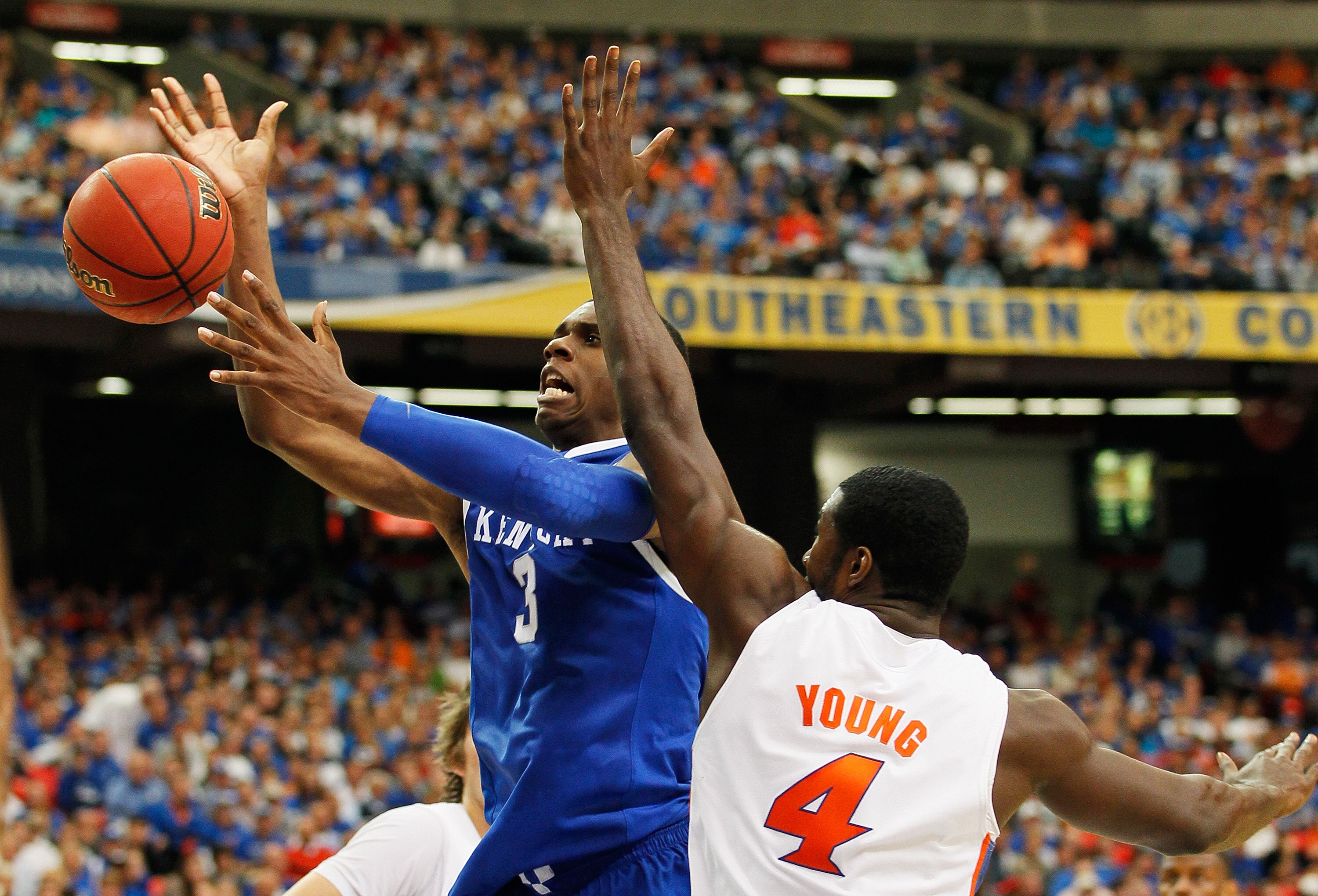 ATLANTA, GA - MARCH 13:  Terrence Jones #3 of the Kentucky Wildcats goes up against Patric Young #4 of the Florida Gators during the championship game of the SEC Men's Basketball Tournament at Georgia Dome on March 13, 2011 in Atlanta, Georgia.  (Photo by