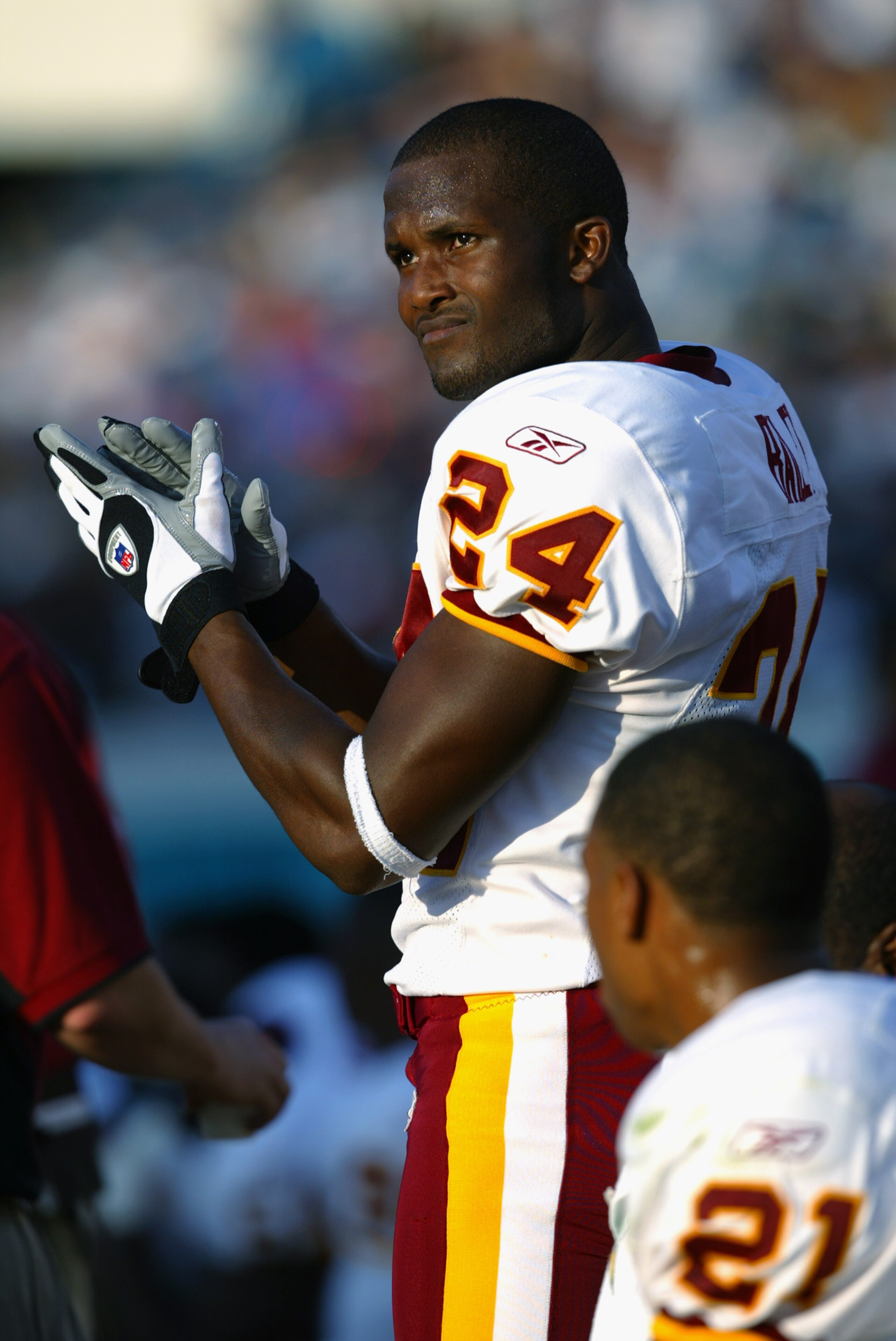 JACKSONVILLE, FL - NOVEMBER 10:  Cornerback Champ Bailey #24 of the Washington Redskins cheers his team on during a game against the Jacksonville Jaguars on November 10, 2002  at Alltel Stadium in Jacksonville, Florida. The Jaguars beat the Redskins 26-7.