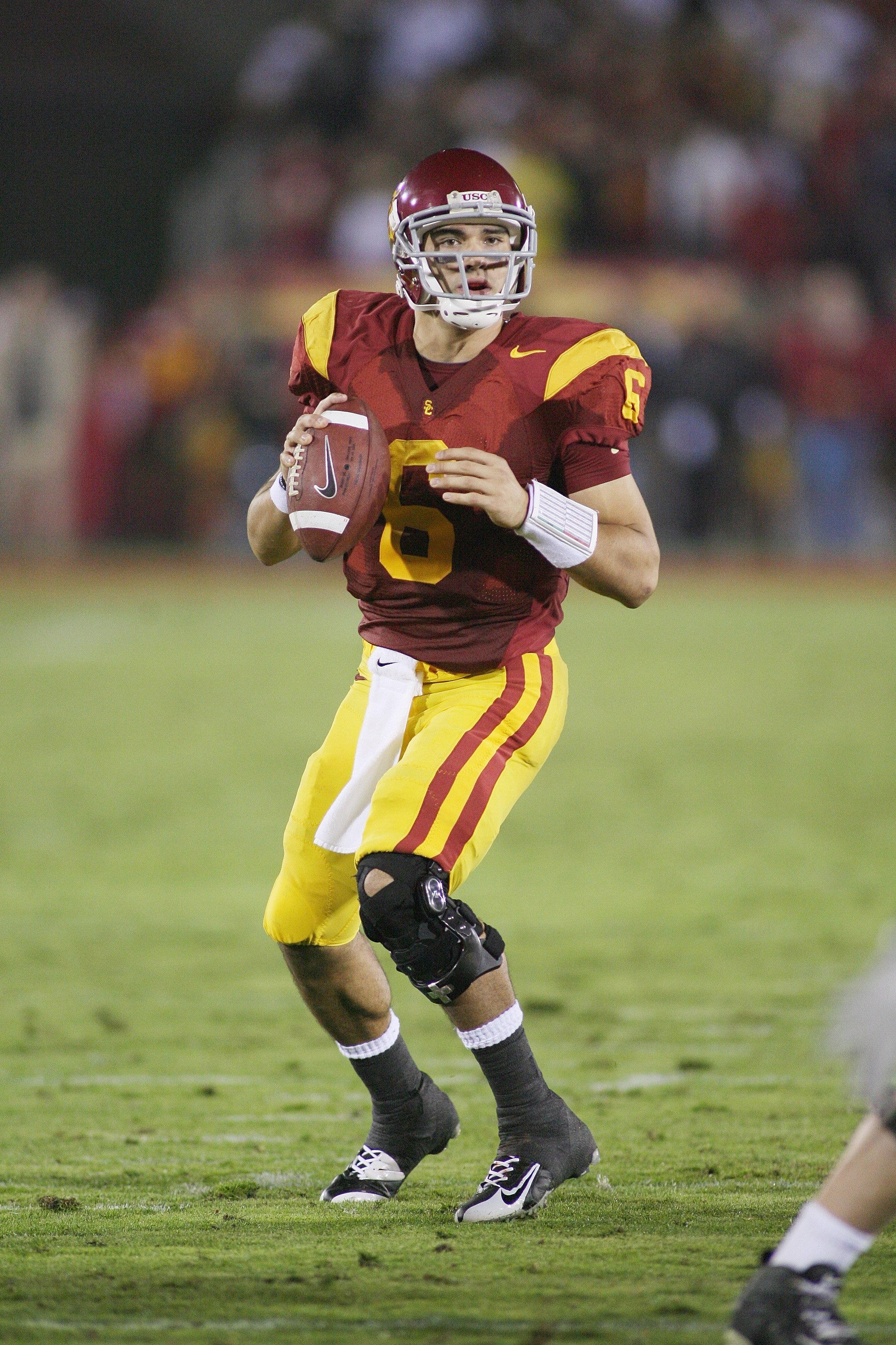 LOS ANGELES - NOVEMBER 29:  Mark Sanchez #6 of the USC Trojans looks to pass against the Notre Dame Fighting Irish on November 29, 2008 at the Los Angeles Memorial Coliseum in Los Angeles, California.  USC won 38-3.  (Photo by Jeff Golden/Getty Images)