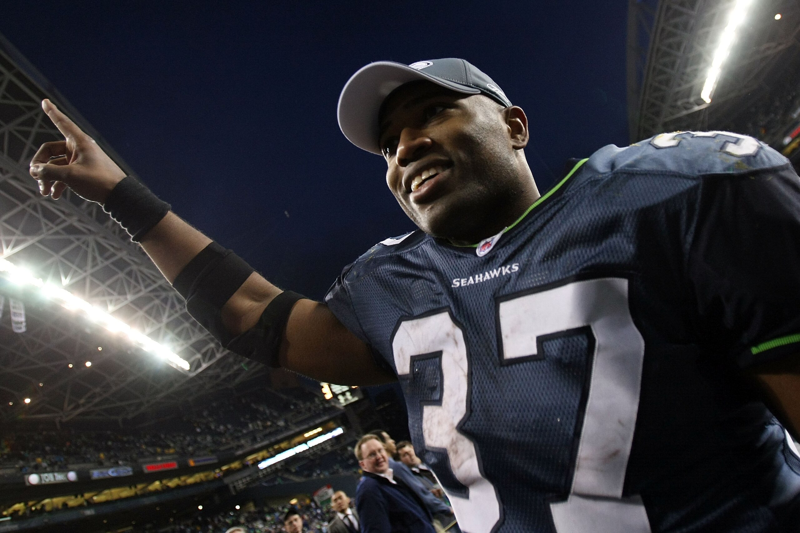 SEATTLE - JANUARY 05:  Running back Shaun Alexander #37 of the Seattle Seahawks celebrates after the Seahawks defeated the Washington Redskins 35-14 during the NFC Wild Card game at Qwest Field on January 5, 2008 in Seattle, Washington.  (Photo by Jed Jac