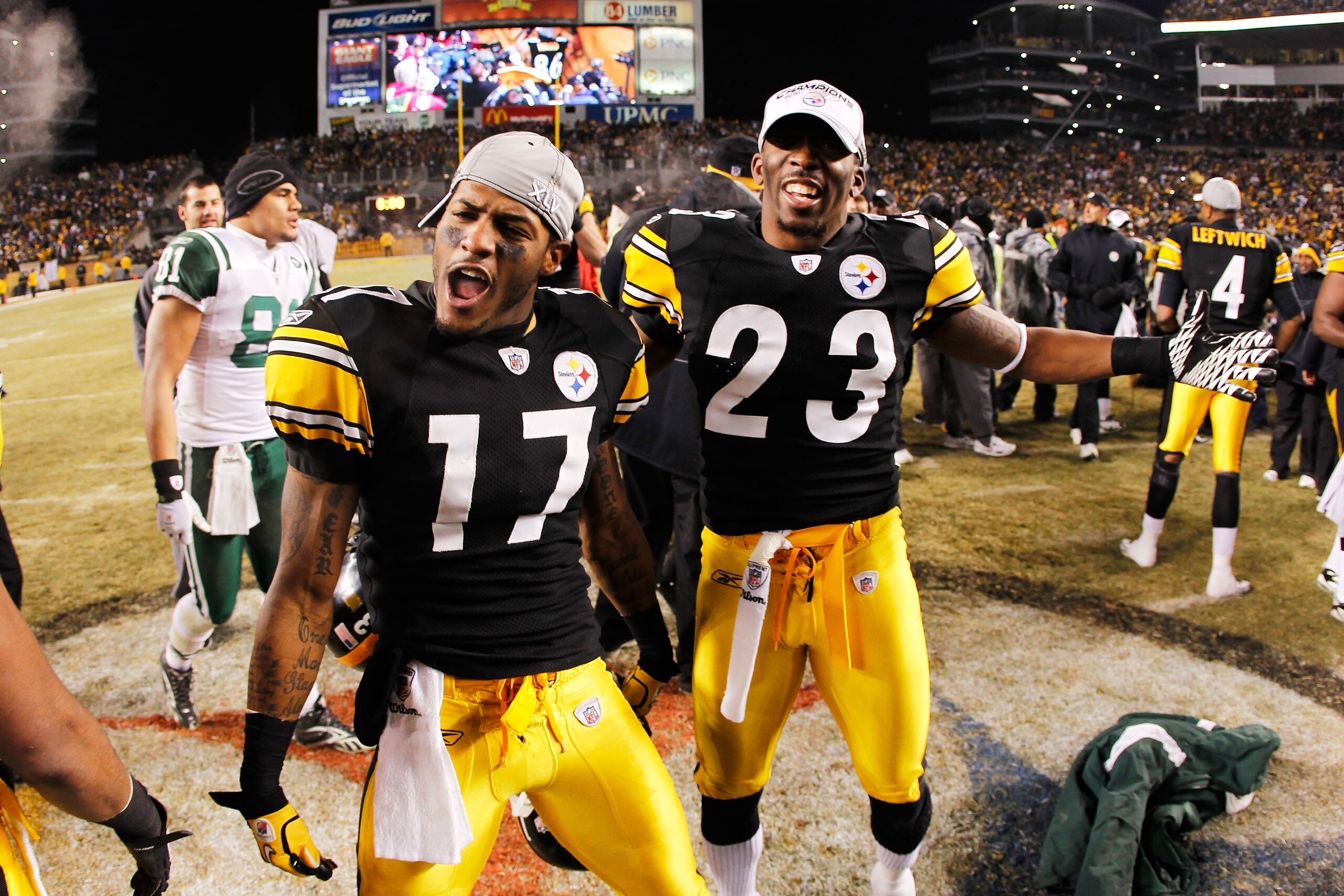 PITTSBURGH, PA - JANUARY 23: Mike Wallace #17 and Keenan Lewis #23 of the Pittsburgh Steelers celebrate their 24 to 19 win over the New York Jets in the 2011 AFC Championship game at Heinz Field on January 23, 2011 in Pittsburgh, Pennsylvania. (Photo by PITTSBURGH, PA - JANUARY 23: Mike Wallace #17 and Keenan Lewis #23 of the Pittsburgh Steelers celebrate their 24 to 19 win over the New York Jets in the 2011 AFC Championship game at Heinz Field on January 23, 2011 in Pittsburgh, Pennsylvania. (Photo by