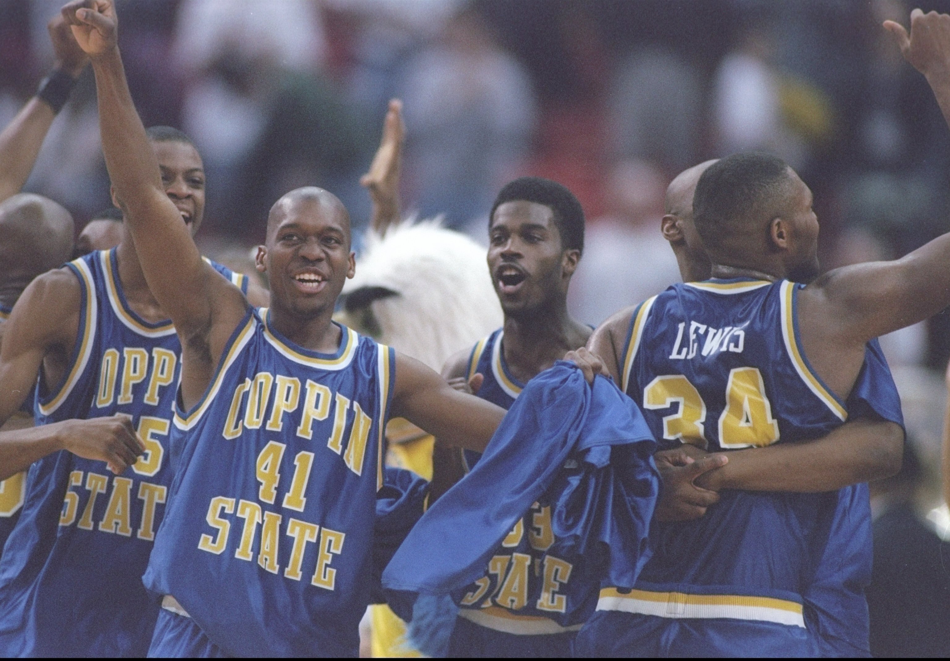 14 Mar 1997:  Guards David Houston and Fred Warnick of the Coppin Eagles celebrate win after a playoff game against the South Carolina Gamecocks at the Pittsburgh Civic Arena in Pittsburgh, Pennsylvania.  The Eagles won the game 78 - 65. Mandatory Credit:
