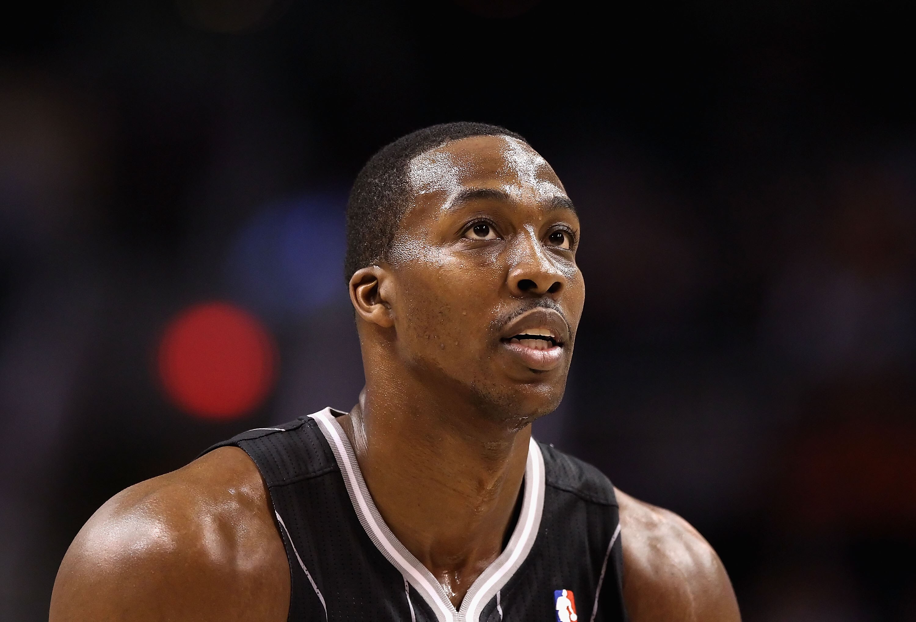 PHOENIX, AZ - MARCH 13:  Dwight Howard #12 of the Orlando Magic shoots a free throw shot during the NBA game against the Phoenix Suns at US Airways Center on March 13, 2011 in Phoenix, Arizona. The Magic defeated the Suns 111-88. NOTE TO USER: User expres