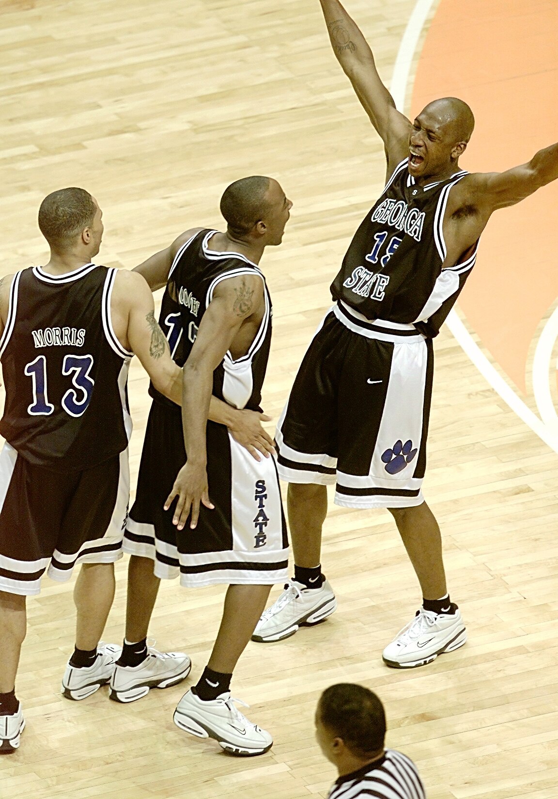 15 Mar 2001:  Sherard Long #15 of the Georgia State Panthers celebrates his go-ahead shot with Kevin Morris #13 and Darryl Cooper #12 in a 50-49 upset of the Wisconsin Badgers during the first round of the NCAA Tournament at the Boise State University Pav