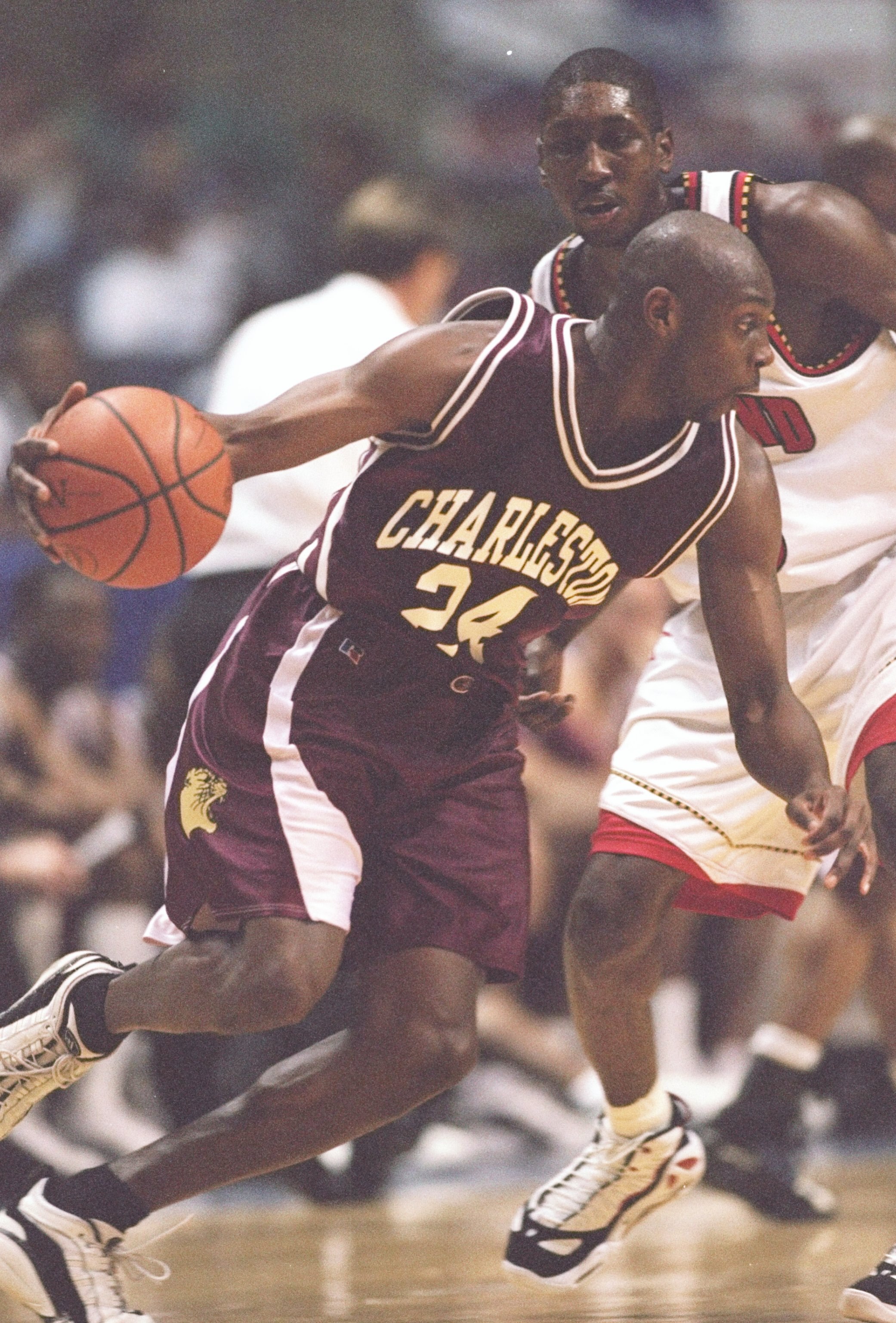 13 Mar 1997:  Guard Anthony Johnson of the Charleston Cougars drives to the basket during a playoff game against the Maryland Terrapins at the Pyramid in Memphis, Tennessee.  Charleston won the game 75 - 66. Mandatory Credit: Stephen Dunn  /Allsport