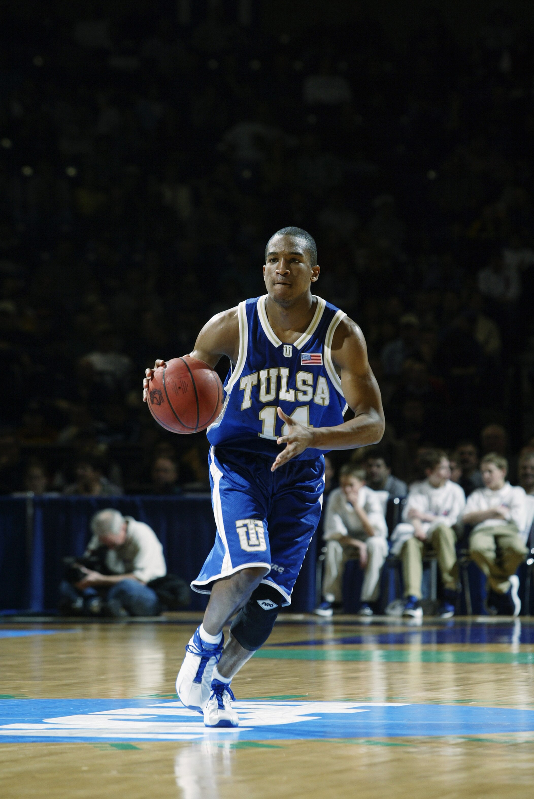 SPOKANE, WA - MARCH 22:  Jason Parker #14 of the Tulsa Golden Hurricanes brings the ball upcourt against the Wisconsin Badgers during the second round of the NCAA Tournament at the Washington State University's Spokane Arena on March 22, 2003 in Spokane,