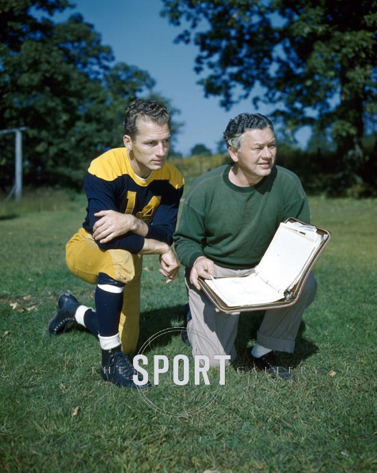"Hey, Coach; mebbe one day they'll name a field after ya!"
