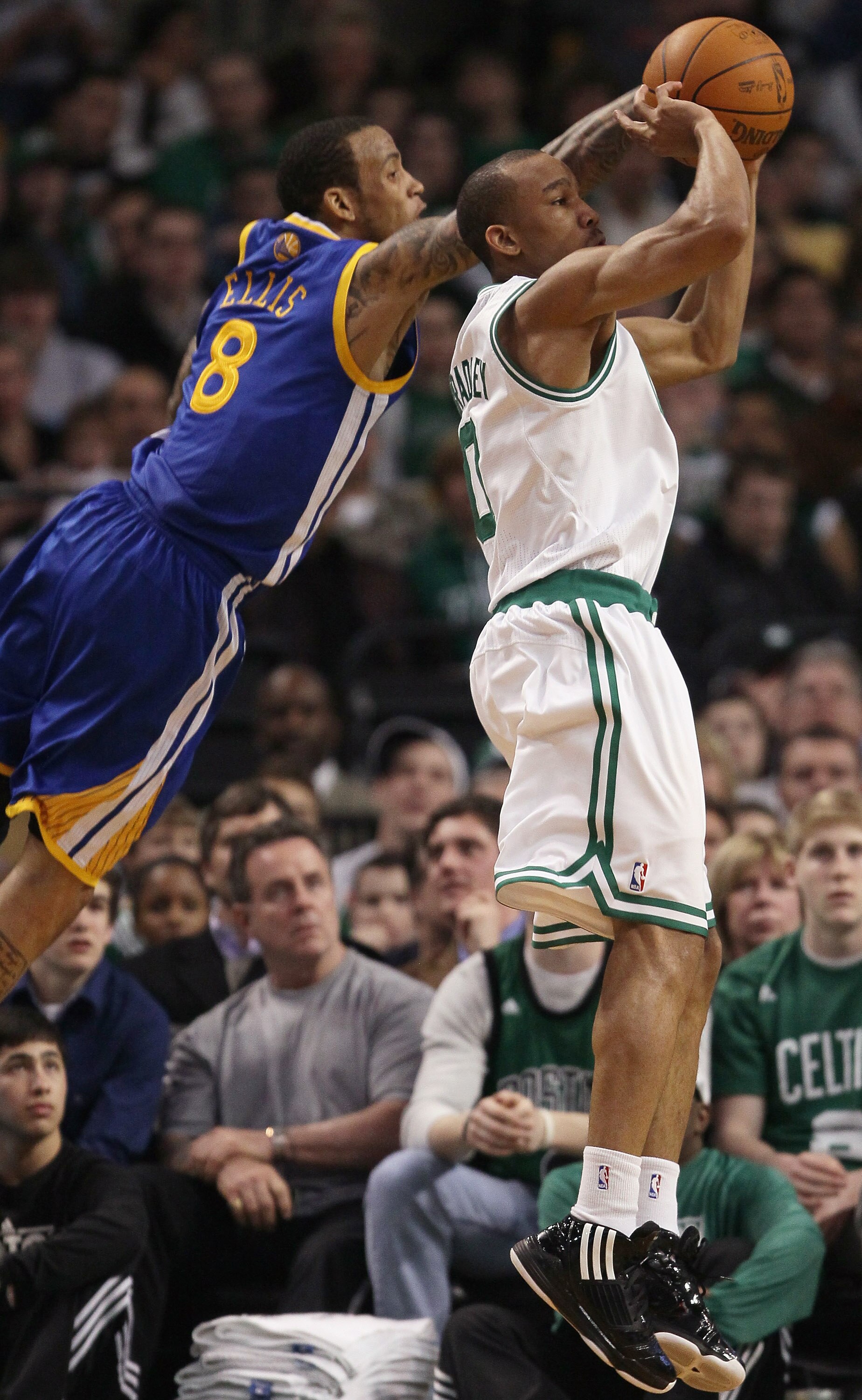 BOSTON, MA - MARCH 04:  Avery Bradley #0 of the Boston Celtics takes a shot as Monta Ellis #8 of the Golden State Warriors defends on March 4, 2011 at the TD Garden in Boston, Massachusetts.  The Celtics defeated the Warriors 107-103. NOTE TO USER: User e