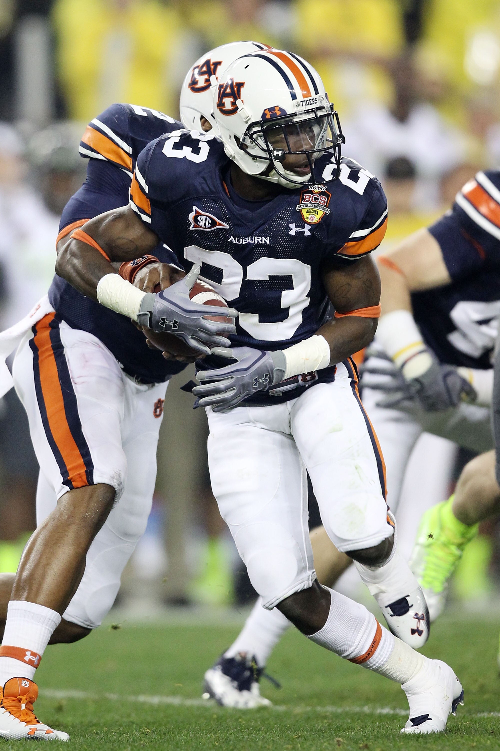 GLENDALE, AZ - JANUARY 10: Onterio McCalebb #23 of the Auburn Tigers runs down field against the Oregon Ducks during the Tostitos BCS National Championship Game at University of Phoenix Stadium on January 10, 2011 in Glendale, Arizona. (Photo by Christi GLENDALE, AZ - JANUARY 10: Onterio McCalebb #23 of the Auburn Tigers runs down field against the Oregon Ducks during the Tostitos BCS National Championship Game at University of Phoenix Stadium on January 10, 2011 in Glendale, Arizona. (Photo by Christi