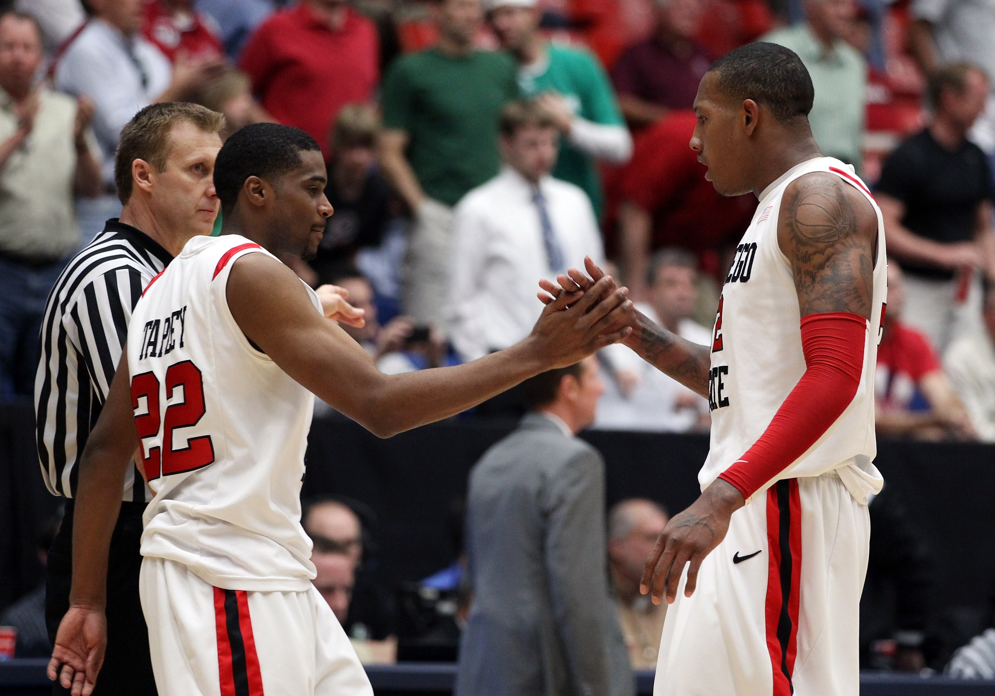 TUCSON, AZ - MARCH 17: Chase Tapley #22 and Billy White #32 of the San Diego State Aztecs celebrate during their 68 to 50 win over the Northern Colorado Bears during the second round of the 2011 NCAA men's basketball tournament at McKale Center on March TUCSON, AZ - MARCH 17: Chase Tapley #22 and Billy White #32 of the San Diego State Aztecs celebrate during their 68 to 50 win over the Northern Colorado Bears during the second round of the 2011 NCAA men's basketball tournament at McKale Center on March