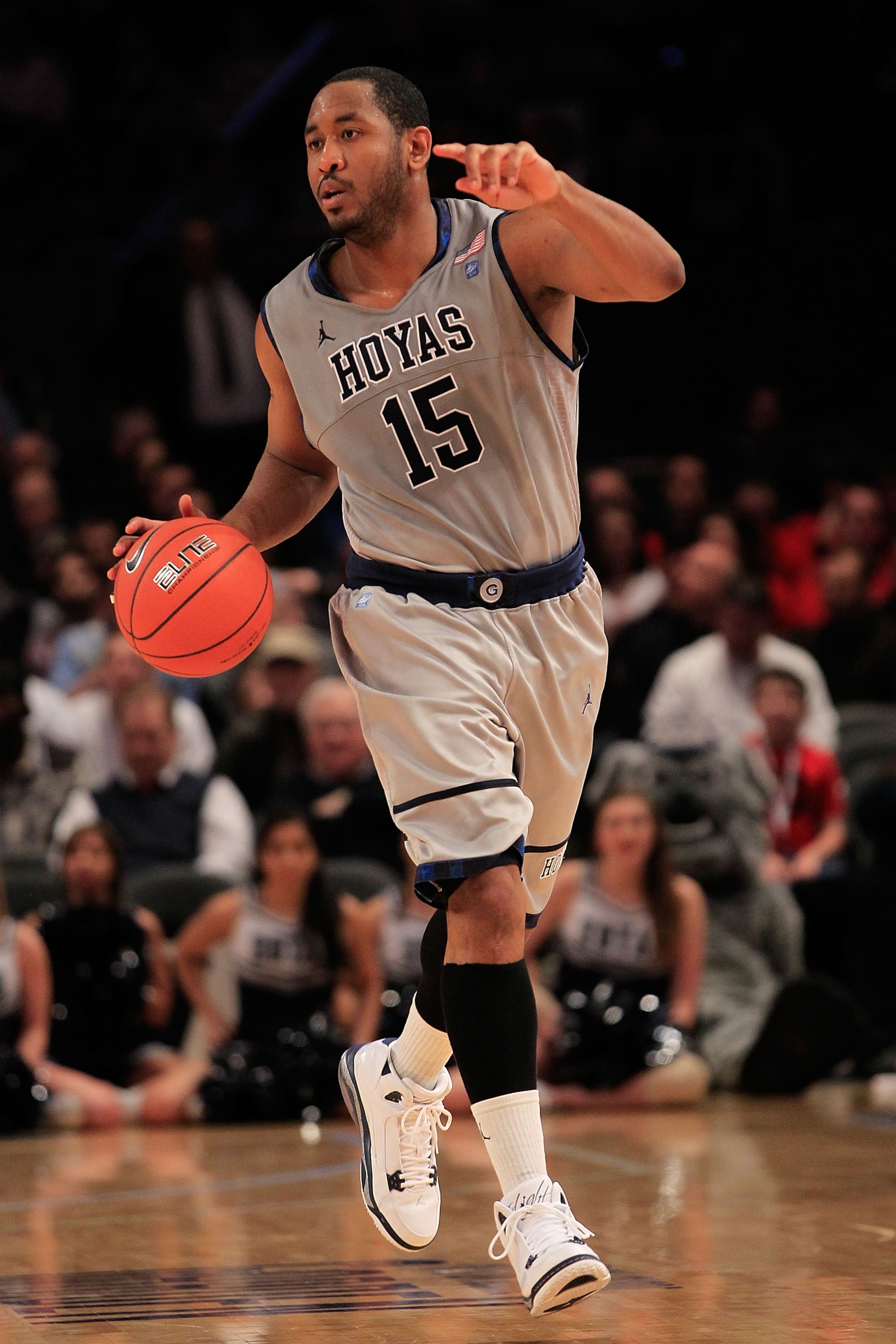 NEW YORK, NY - MARCH 09: Austin Freeman #15 of the Georgetown Hoyas dribbles the ball against the Connecticut Huskies during the second round of the 2011 Big East Men's Basketball Tournament presented by American Eagle Outfitters at Madison Square Garden NEW YORK, NY - MARCH 09: Austin Freeman #15 of the Georgetown Hoyas dribbles the ball against the Connecticut Huskies during the second round of the 2011 Big East Men's Basketball Tournament presented by American Eagle Outfitters at Madison Square Garden