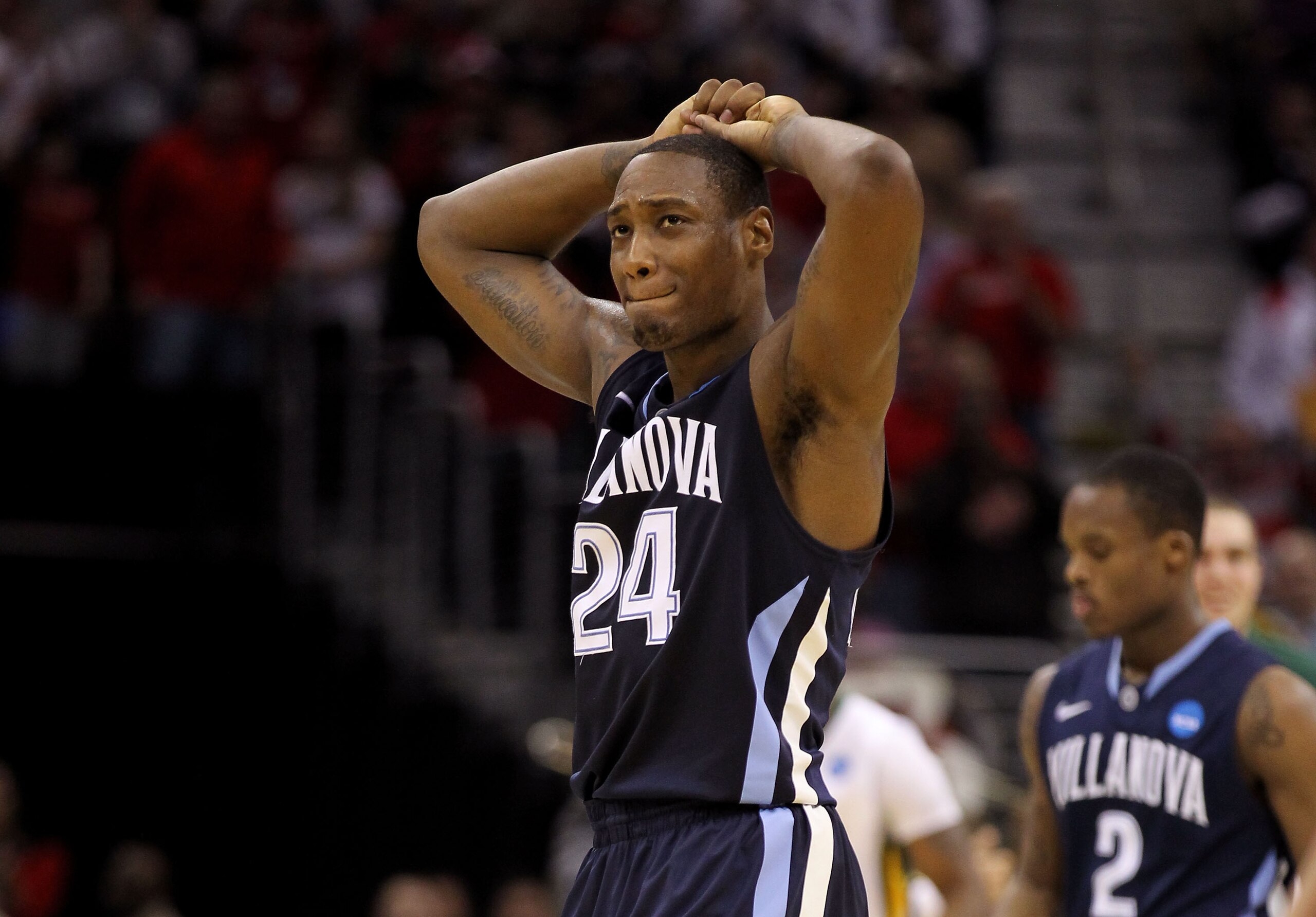 CLEVELAND, OH - MARCH 18: Corey Stokes #24 of the Villanova Wildcats walks off the court after being defeated by the George Mason Patriots during the second round of the 2011 NCAA men's basketball tournament at Quicken Loans Arena on March 18, 2011 in Cle CLEVELAND, OH - MARCH 18: Corey Stokes #24 of the Villanova Wildcats walks off the court after being defeated by the George Mason Patriots during the second round of the 2011 NCAA men's basketball tournament at Quicken Loans Arena on March 18, 2011 in Cle