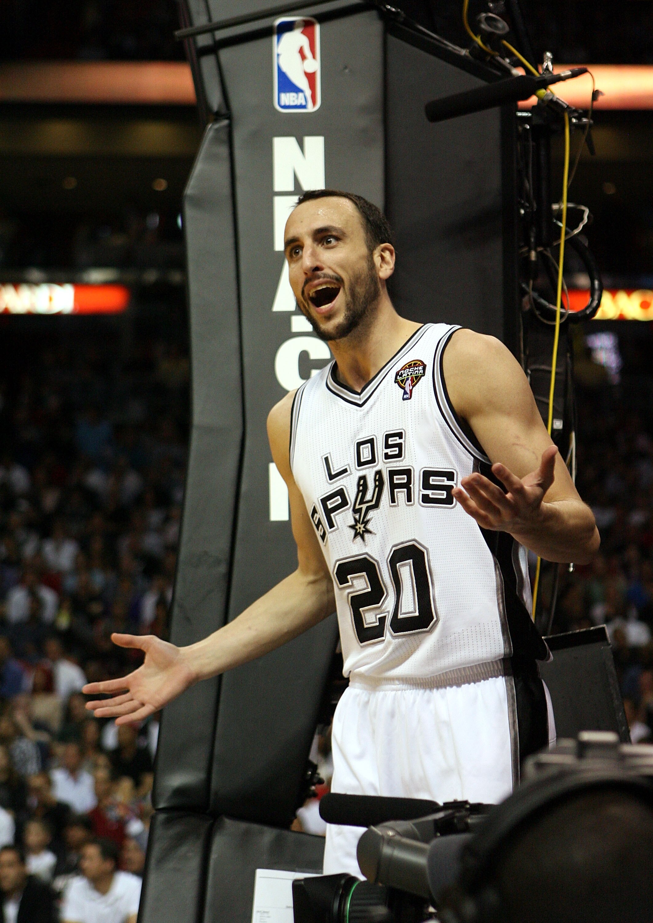 MIAMI - MARCH 14: Forward Manu Ginobili #20 complains to the referee against the Miami Heat at American Airlines Arena on March 14, 2011 in Miami, Florida. NOTE TO USER: User expressly acknowledges and agrees that, by downloading and/or using this Photogr