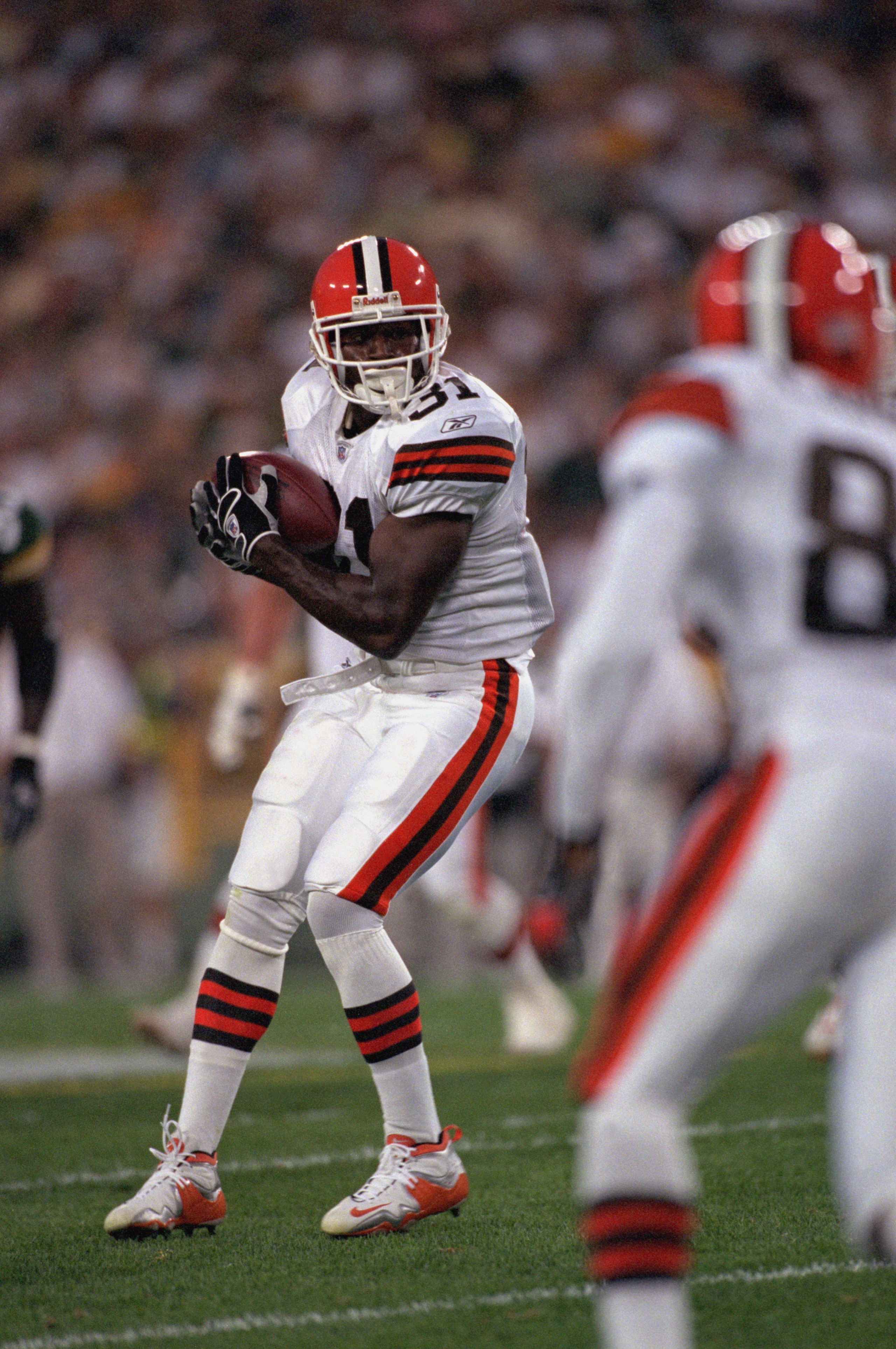 GREEN BAY, WI - AUGUST 26:  Running back William Green #31 of the Cleveland Browns runs with the ball during the NFL preseason game against the Green Bay Packers on August 26, 2002 at Lambeau Field in Green Bay, Wisconsin.  The Packers defeated the Browns