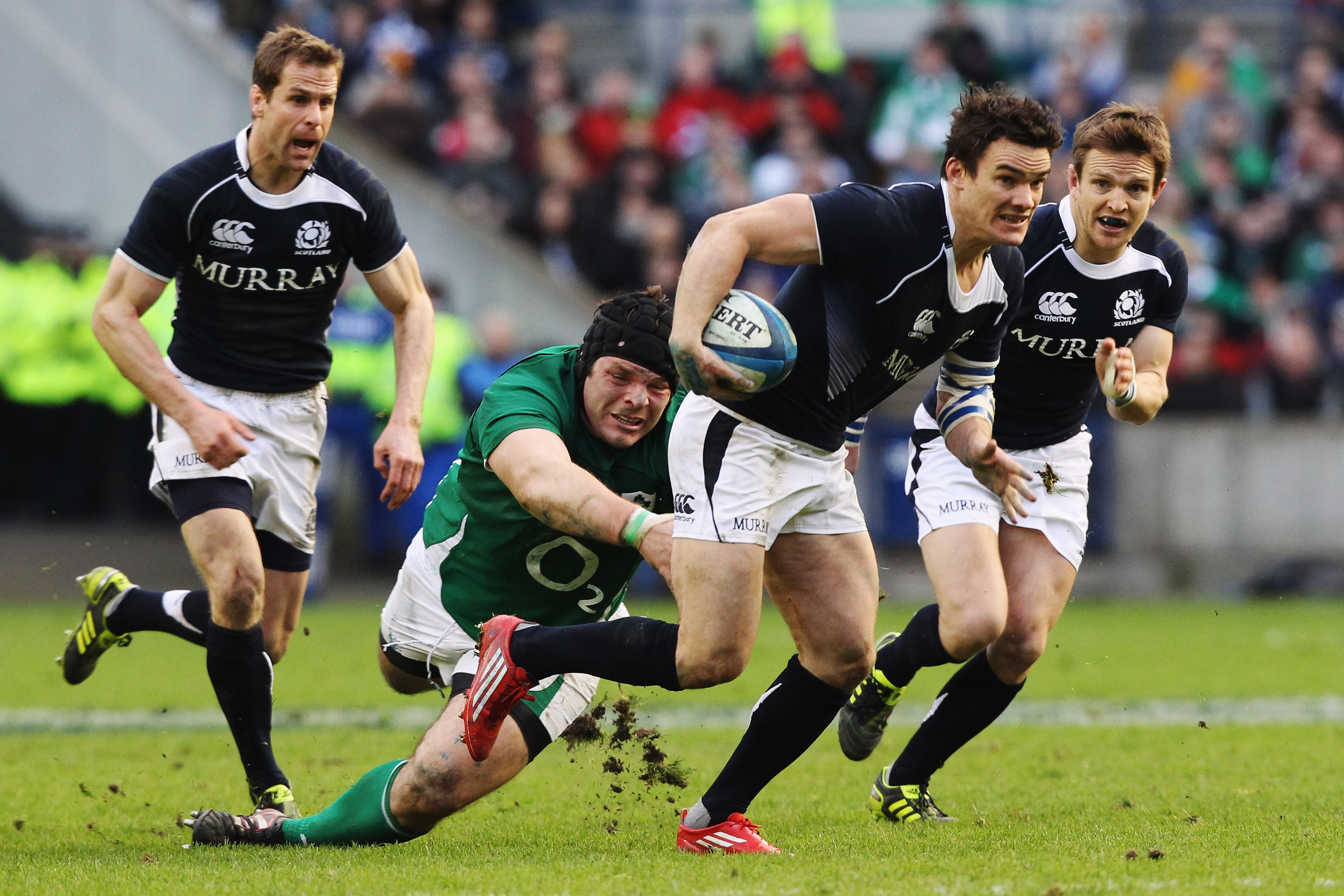 EDINBURGH, SCOTLAND - FEBRUARY 27:  Max Evans of Scotland holds off the challenge of Mike Ross of Ireland during the RBS 6 Nations Championship match between Scotland and Ireland at Murrayfield on February 27, 2011 in Edinburgh, Scotland.  (Photo by David