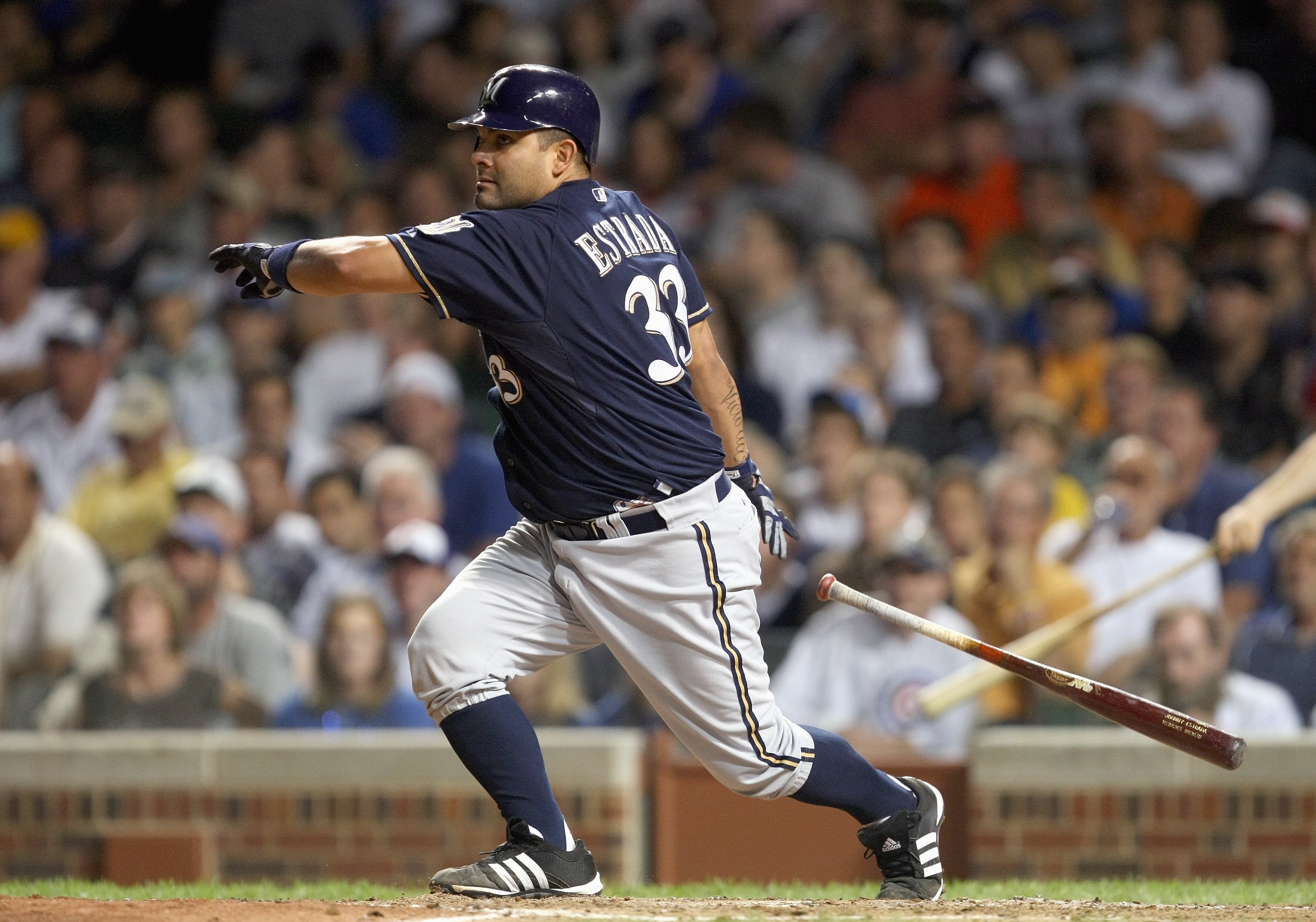 CHICAGO - AUGUST 29: Johnny Estrada #33 of the Milwaukee Brewers swings at the pitch during the game against the Chicago Cubs on August 29, 2007 at Wrigley Field in Chicago, Illinois. (Photo by Jonathan Daniel/Getty Images)