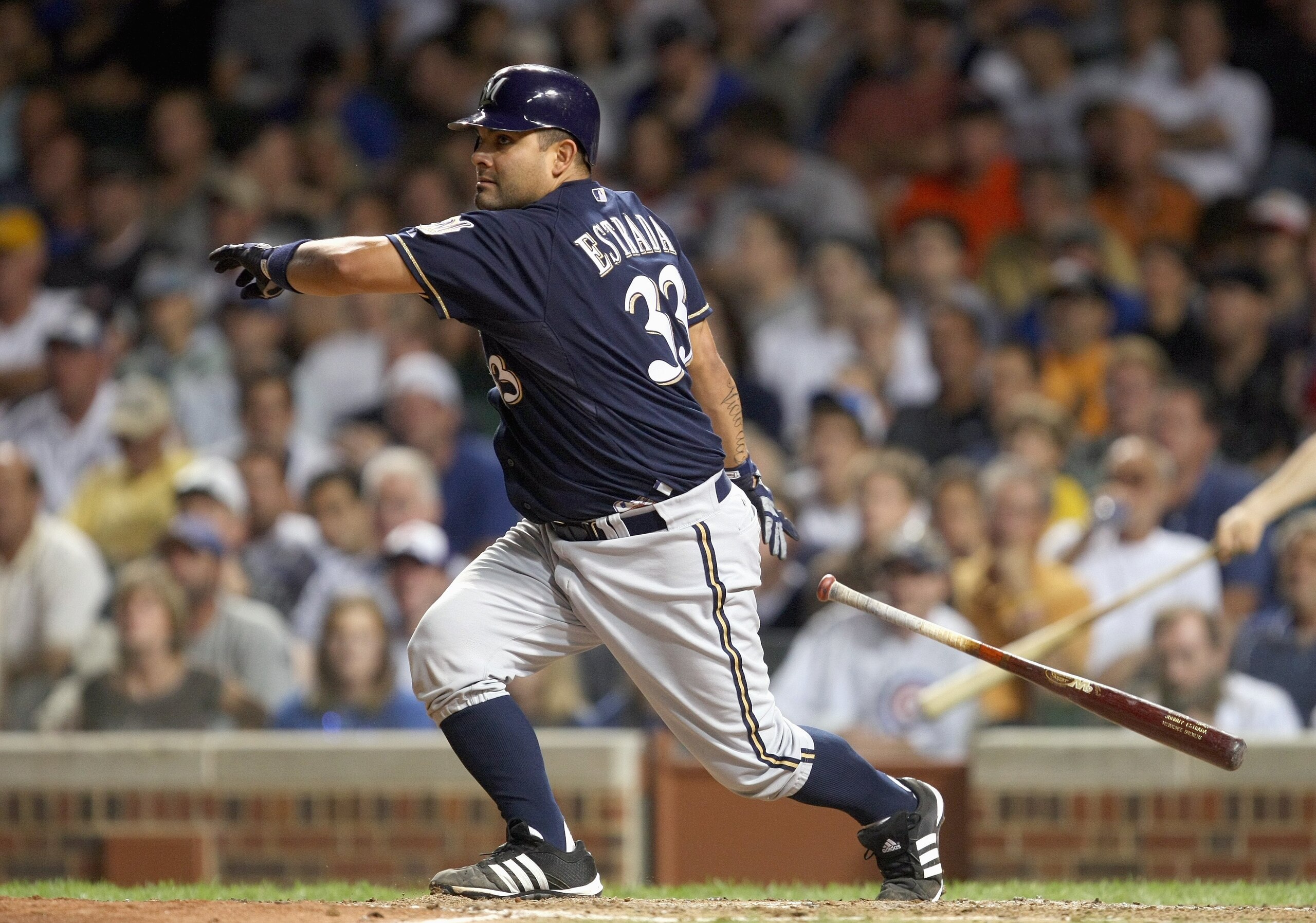 CHICAGO - AUGUST 29: Johnny Estrada #33 of the Milwaukee Brewers swings at the pitch during the game against the Chicago Cubs on August 29, 2007 at Wrigley Field in Chicago, Illinois. (Photo by Jonathan Daniel/Getty Images)
