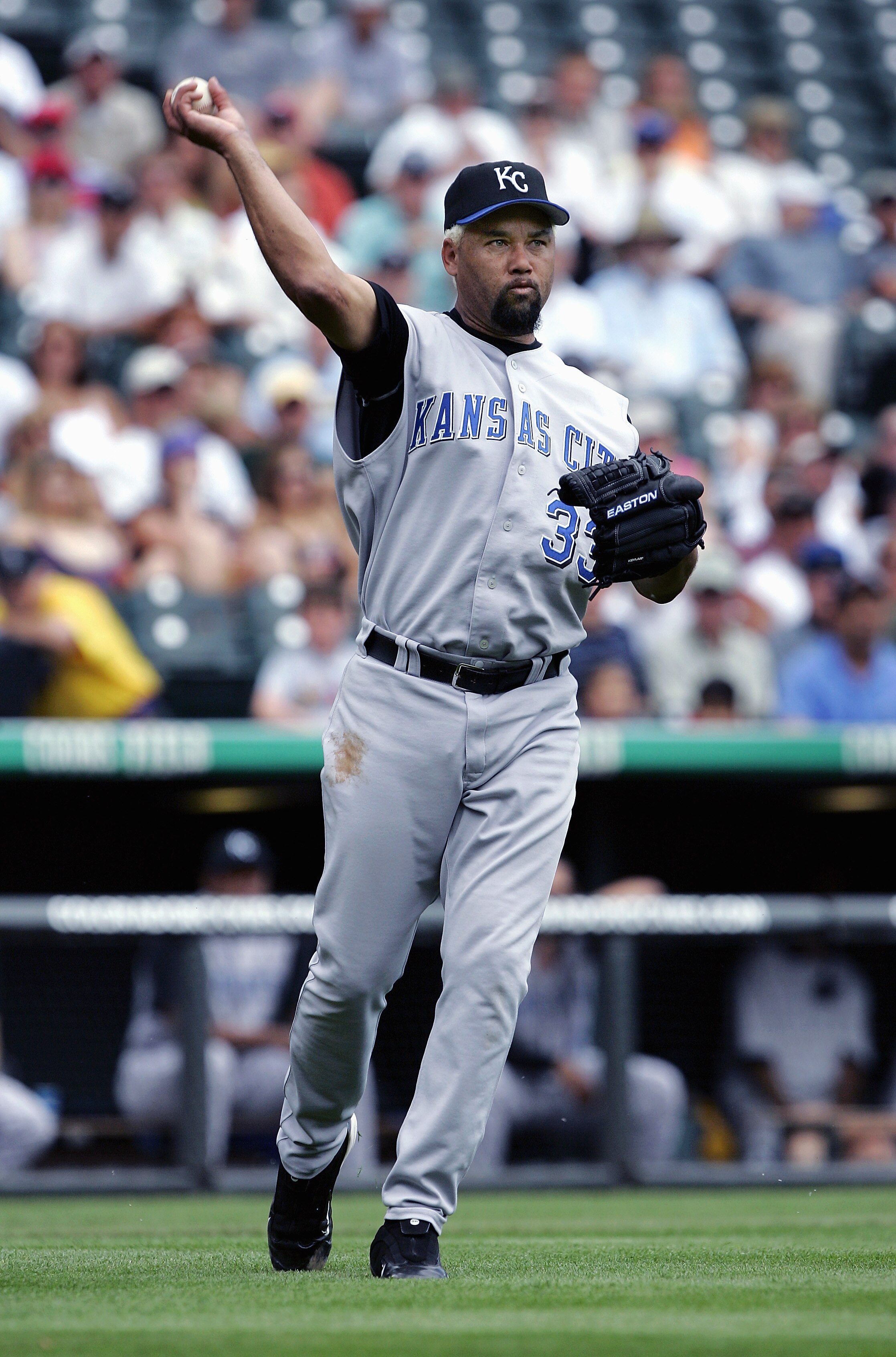 DENVER - JUNE 26:  Jose Lima #33 of the Kansas City Royals fields the ball during the game with the Colorado Rockies on June 26, 2005 at Coors Field in Denver, Colorado.  The Rockies won 9-4.  (Photo by Brian Bahr/Getty Images)