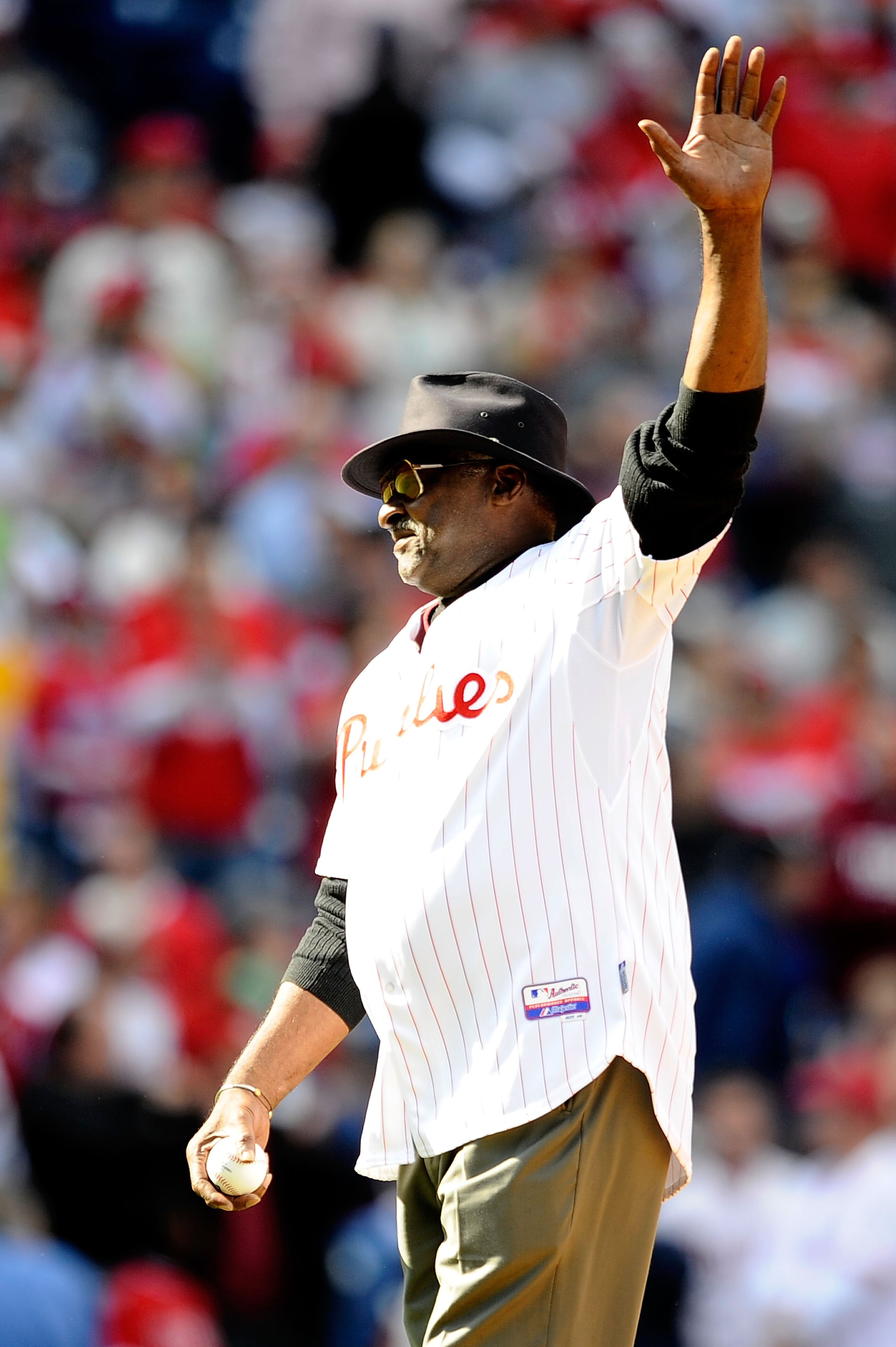 PHILADELPHIA - OCTOBER 07:  Dick Allen, former player for the Philadelphia Phillies gets set to throw out the ceremonial first pitch prior to Game One of the NLDS between the Philadelphia Phillies and the Colorado Rockies during the 2009 MLB Playoffs at C