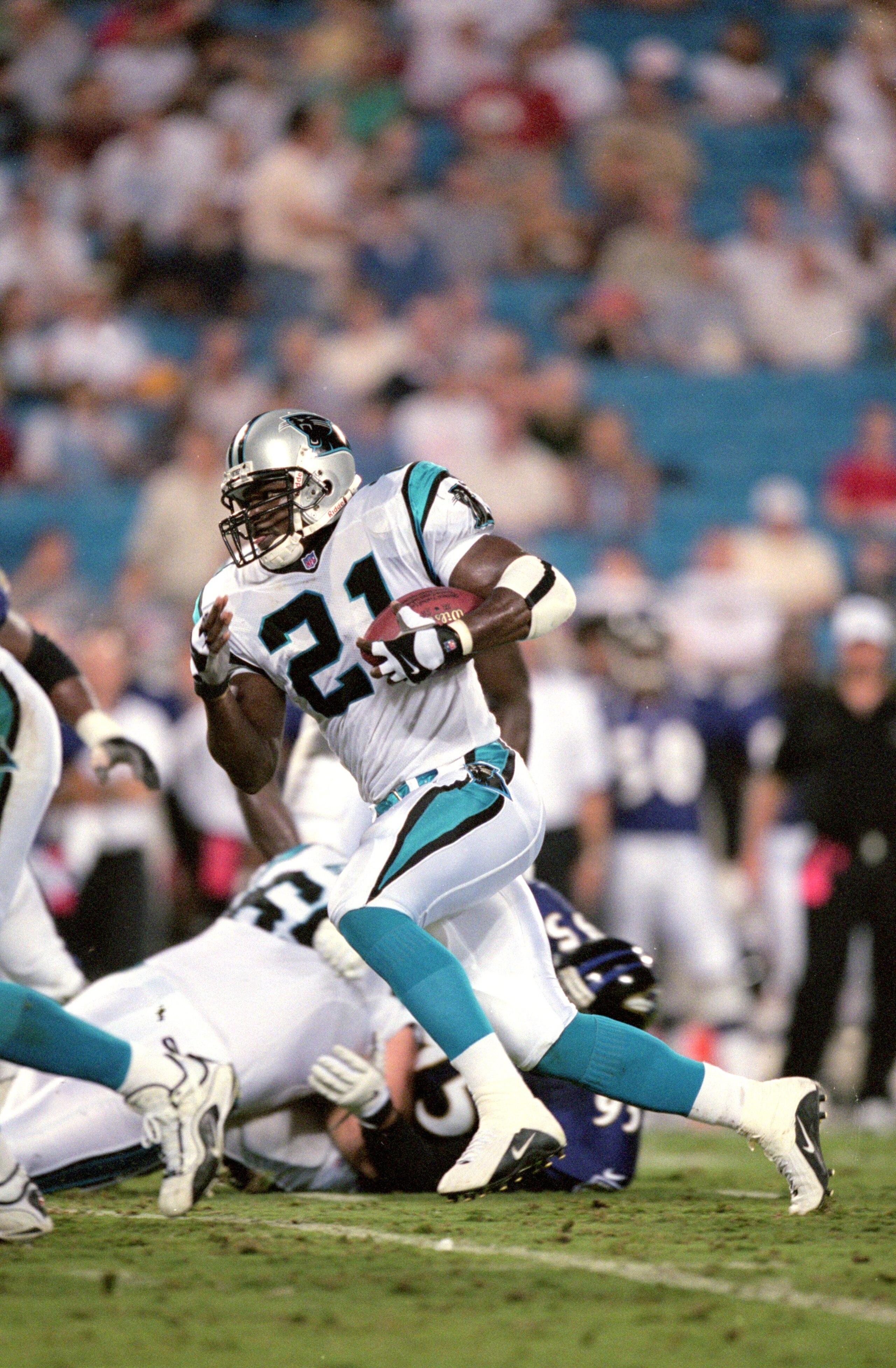 18 Aug 2000:  Tim Biakabutuka #21 of the Carolina Panthers runs with the ball during the Pre-Season game against the Baltimore Ravens at Ericsson Stadium in Charlotte, North Carolina.  The Ravens defeated the Panthers 24-13.Mandatory Credit: Craig Jones