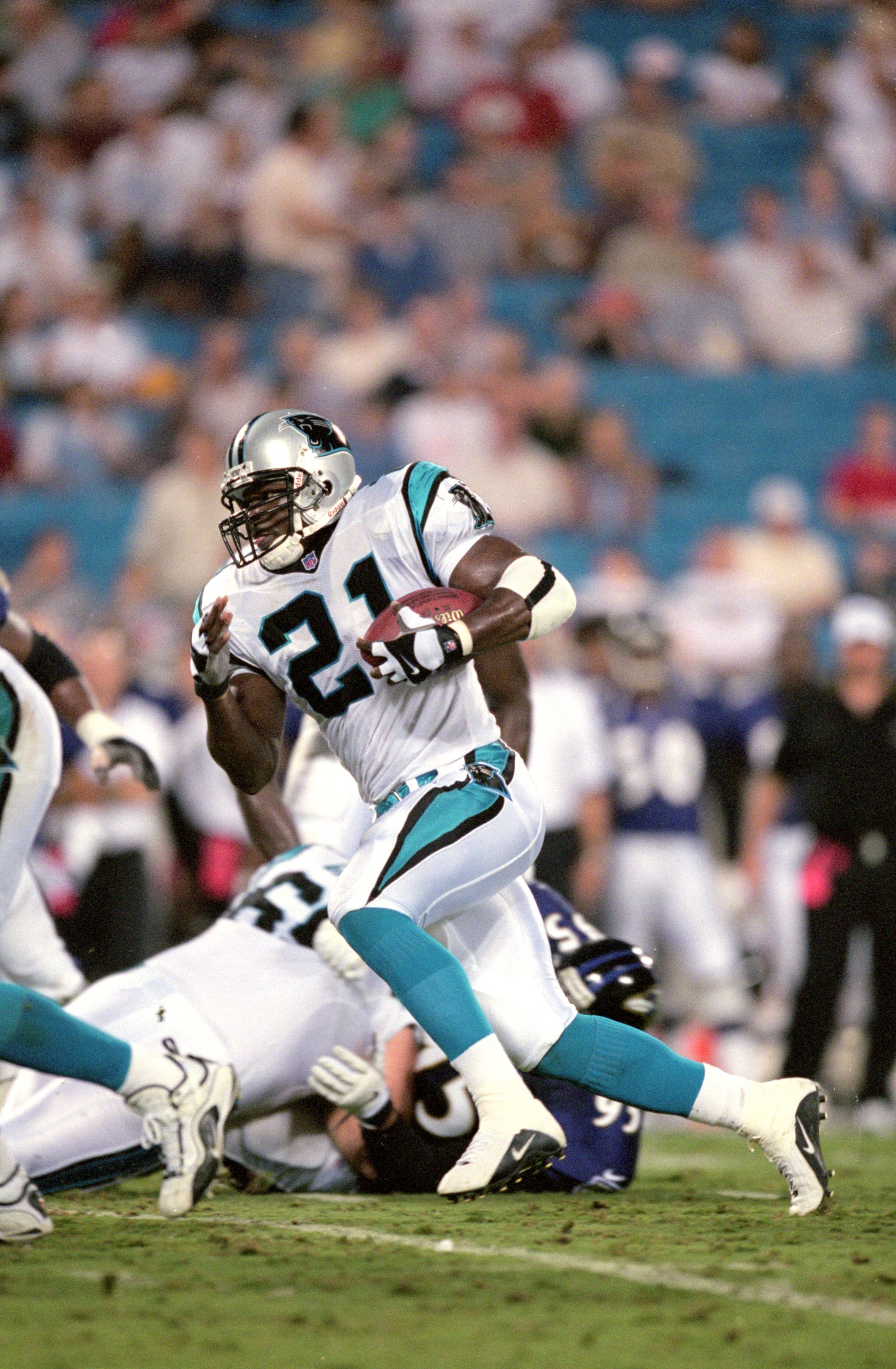 18 Aug 2000:  Tim Biakabutuka #21 of the Carolina Panthers runs with the ball during the Pre-Season game against the Baltimore Ravens at Ericsson Stadium in Charlotte, North Carolina.  The Ravens defeated the Panthers 24-13.Mandatory Credit: Craig Jones