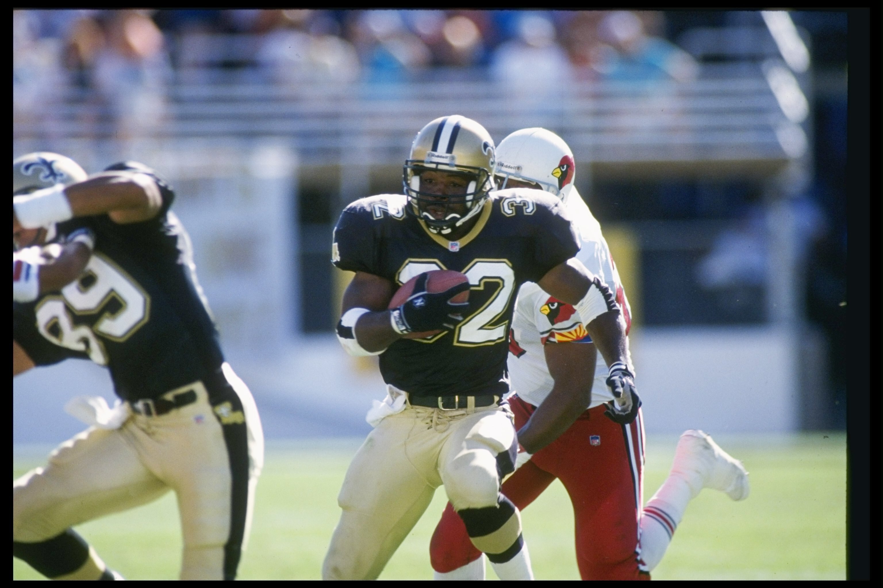 18 Oct 1992: Running back Vaughn Dunbar of the New Orleans Saints moves the ball during a game against the Phoenix Cardinals at Sun Devil Stadium in Tempe, Arizona. The Saints won the game, 30-21.